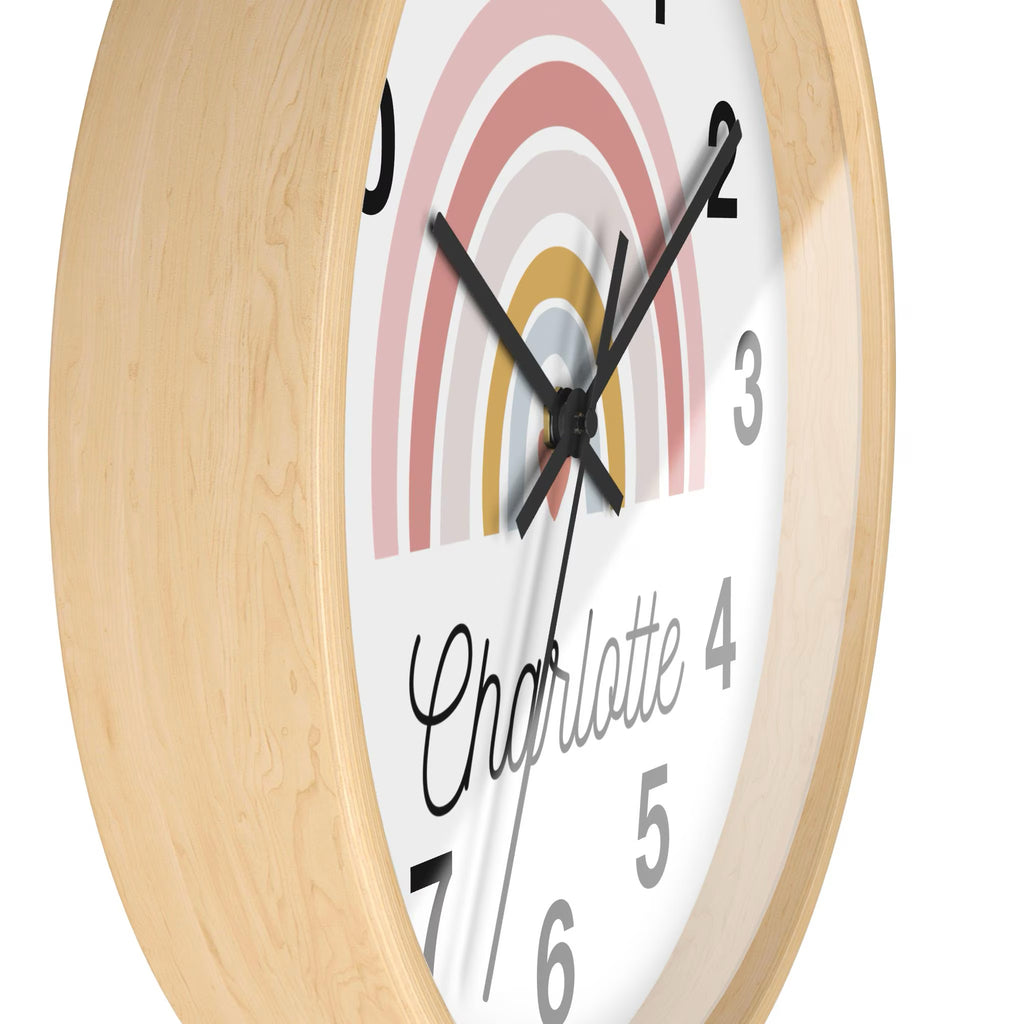 Girls custom name rainbow heart silent wood wall clock with a round wooden frame and pastel rainbow design featuring name charlotte 4