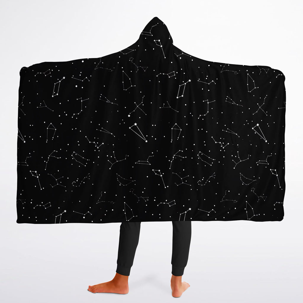 Black hooded wearable blanket for kids with white constellation pattern featuring realistic star designs