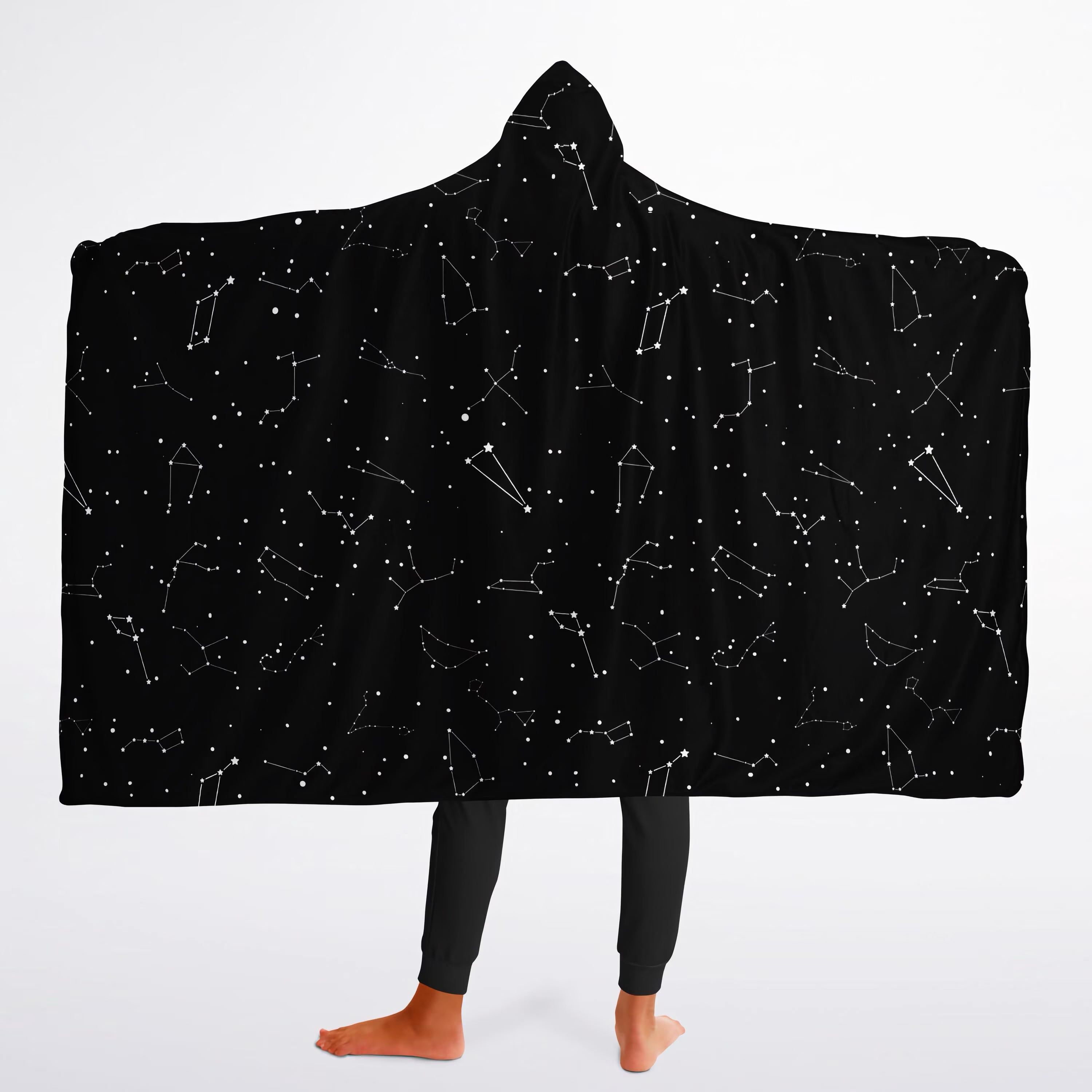 Black hooded wearable blanket for kids with white constellation pattern featuring realistic star designs