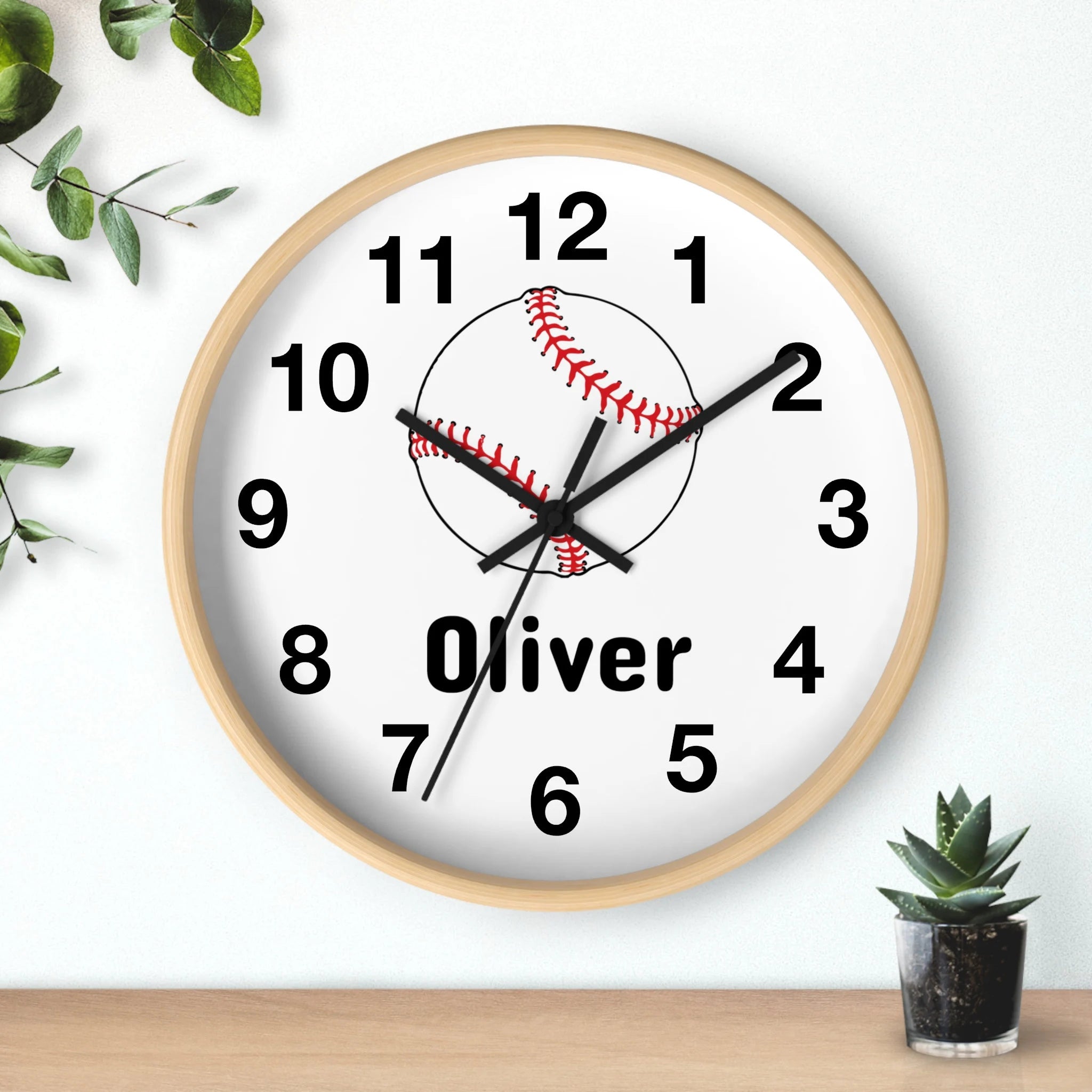 Kids custom name baseball silent wood wall clock with round wooden frame white face black numerals and red baseball design