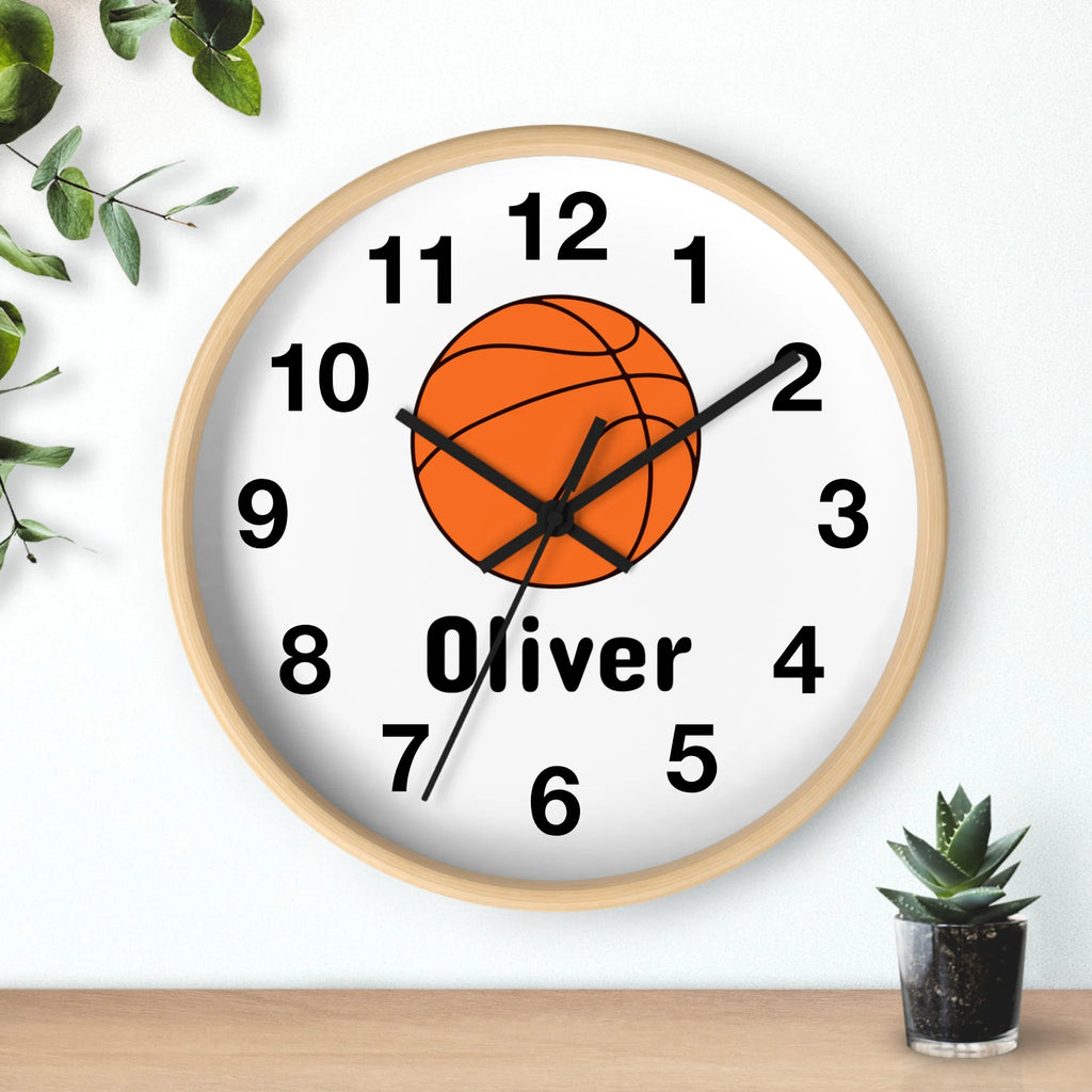 Kids custom name basketball silent wood wall clock with light wood frame white face black numerals and orange basketball design