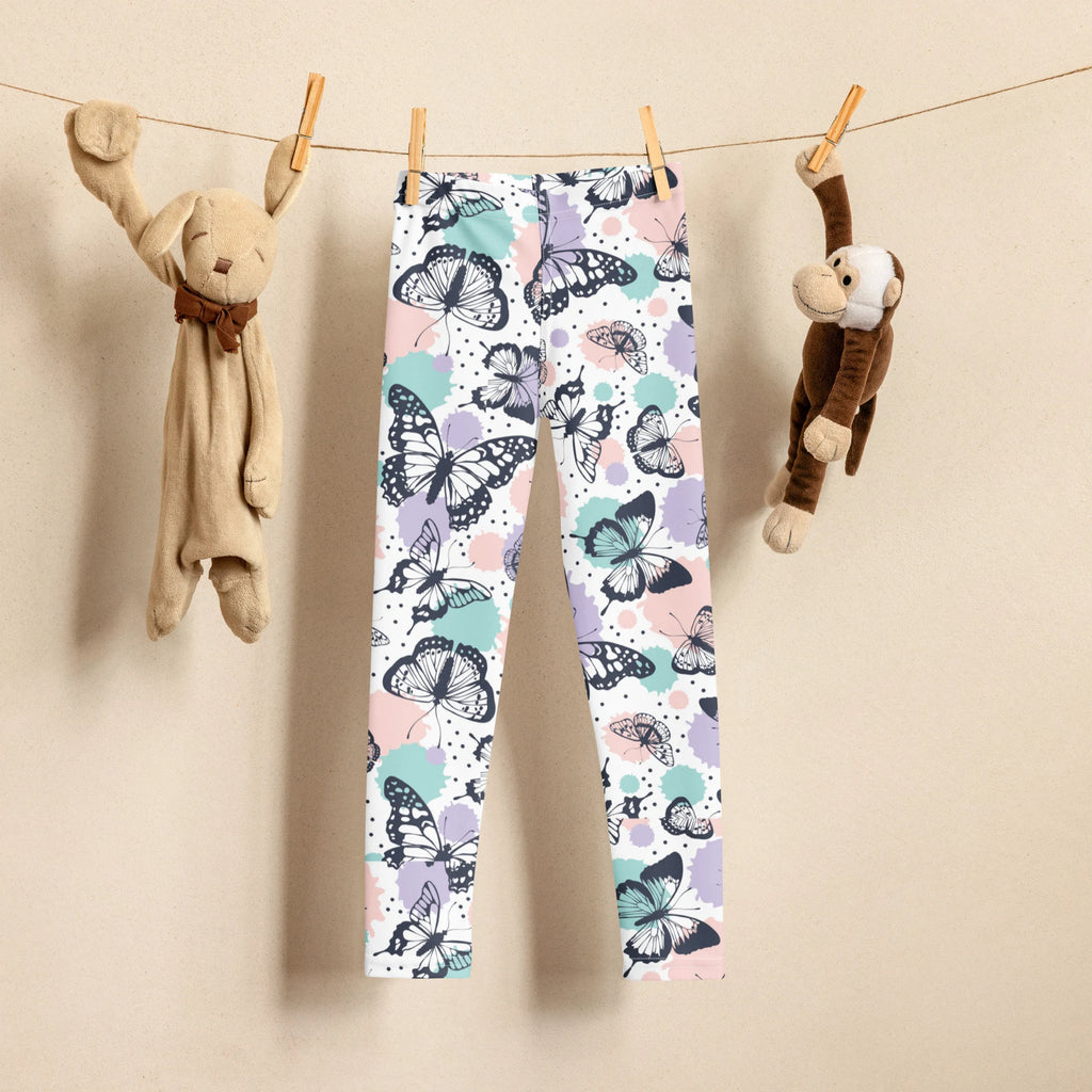 Girls butterfly buttery soft white leggings with black butterfly pattern and pastel mint lavender pink splashes