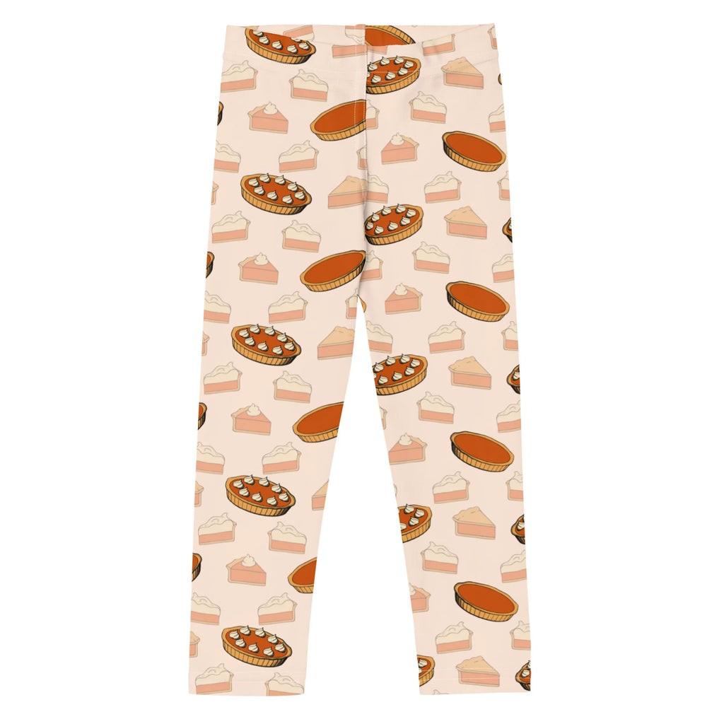 Kids pumpkin pie leggings in cream with playful illustrated pumpkin pie patterns in warm orange brown and beige tones