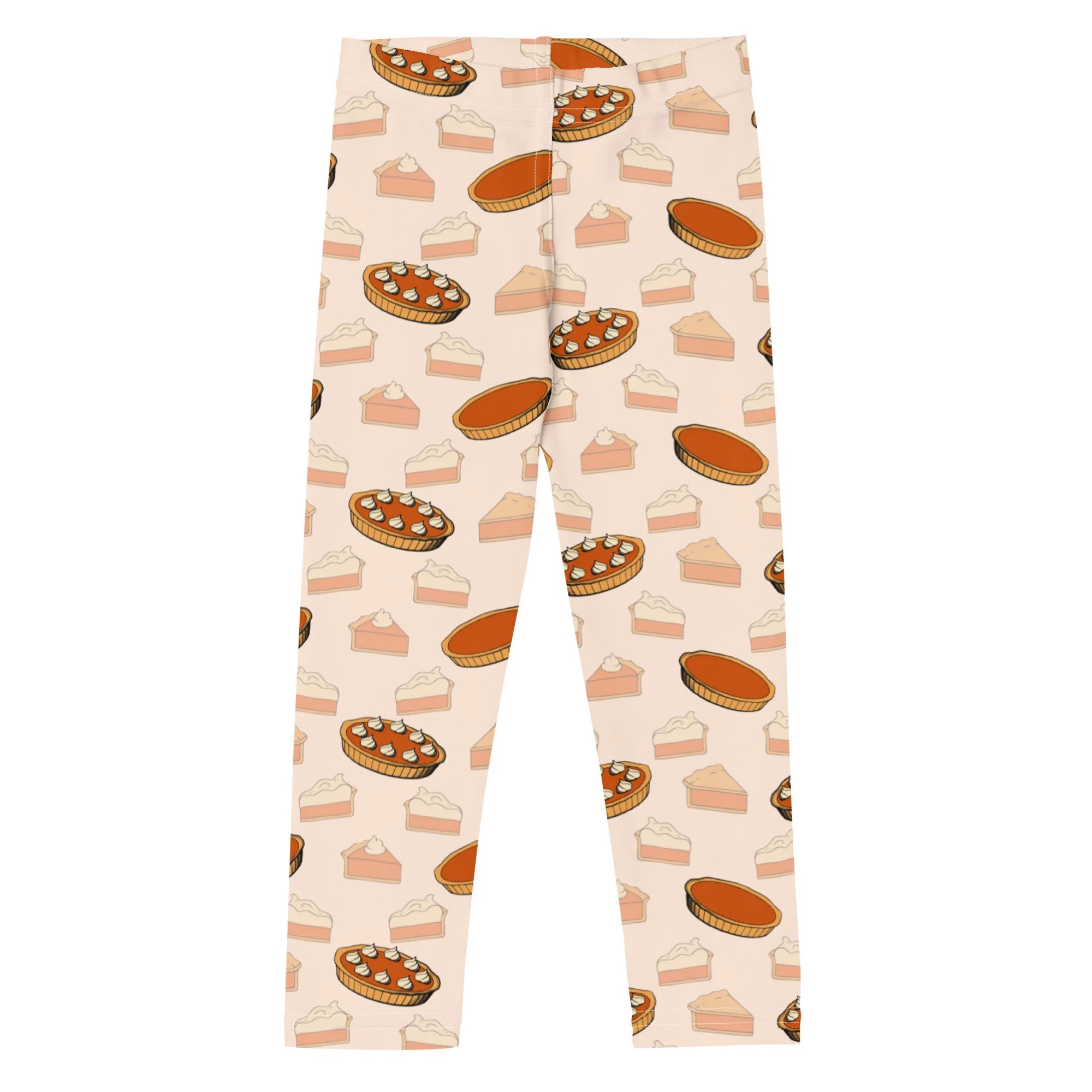 Kids pumpkin pie leggings in cream with playful illustrated pumpkin pie patterns in warm orange brown and beige tones