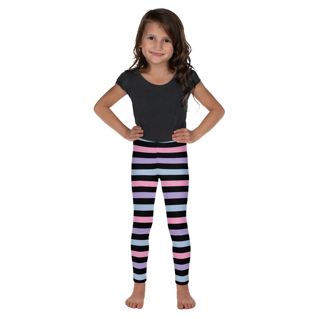 A child wearing girls colorful striped buttery soft leggings in purple black blue with horizontal stripes