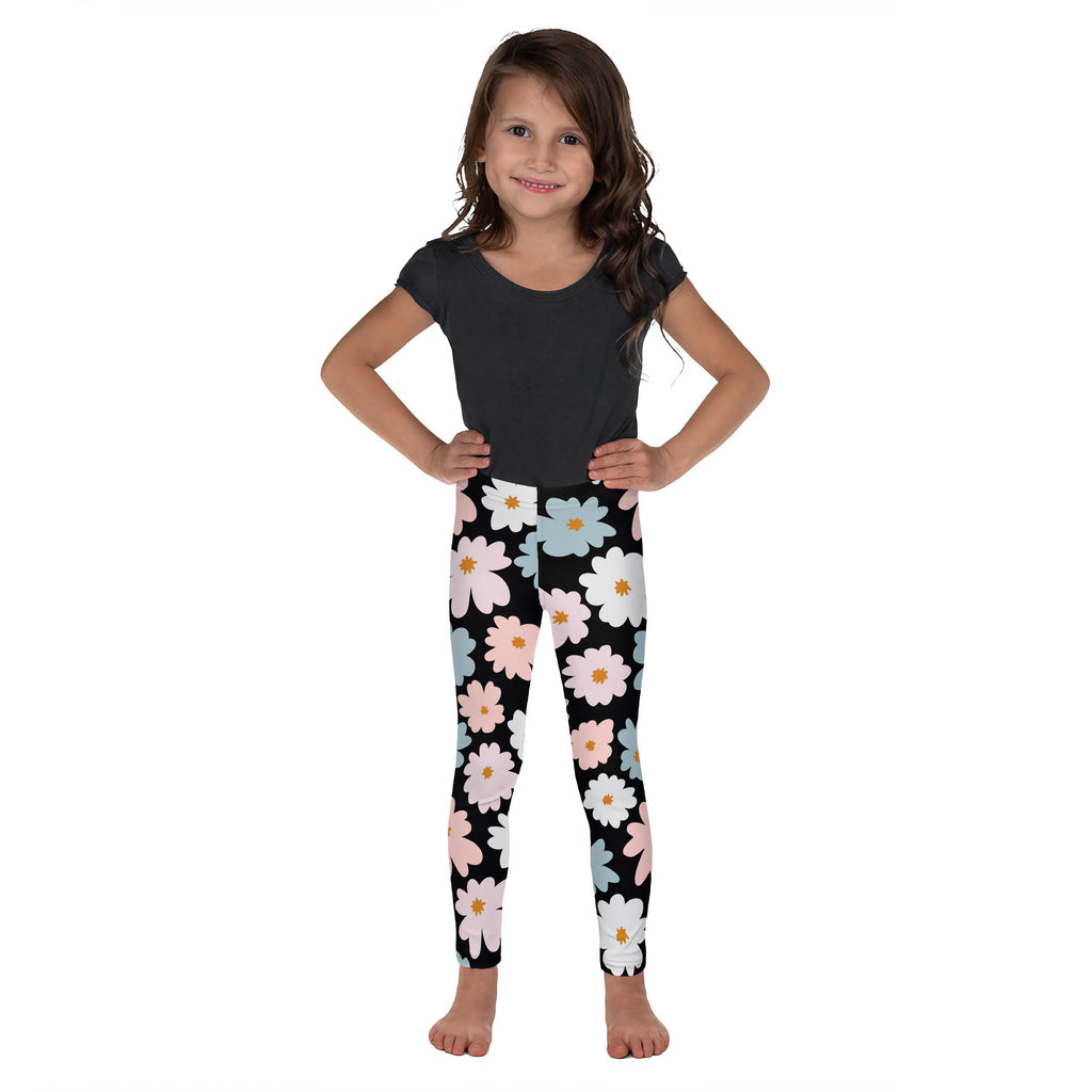 Girls flower buttery soft black leggings with a cheerful pastel pink white and light blue daisy pattern