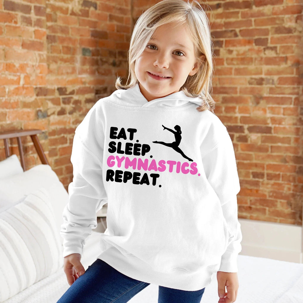 Girls white hooded sweatshirt with black and pink eat text from eat sleep gymnastics repeat hoodie design