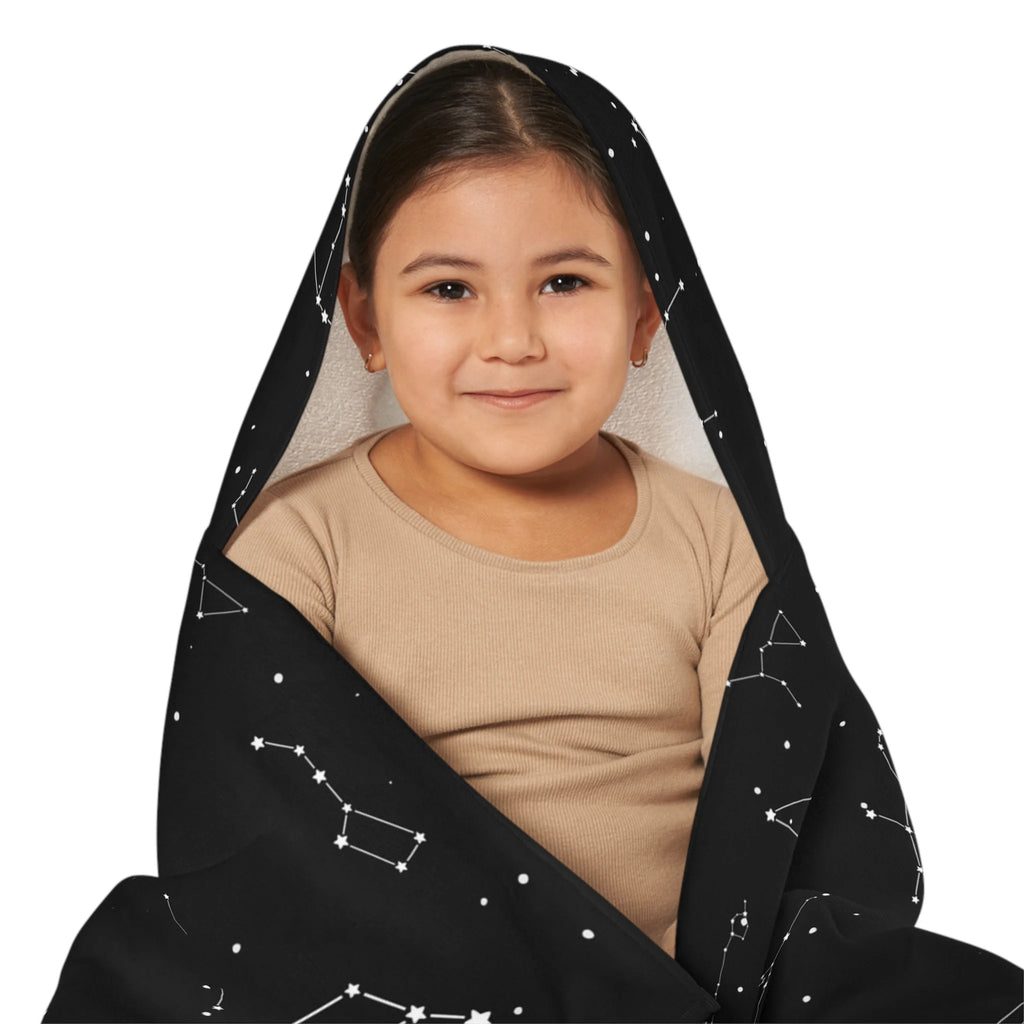 Child wearing black kids realistic constellations hooded towel with white star patterns soft absorbent wrap