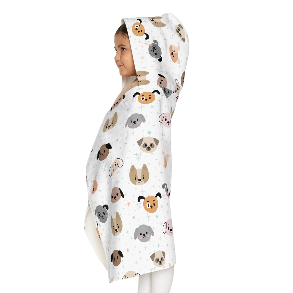 White hooded kids towel with soft absorbent fabric featuring colorful cartoon dogs for bath and beach use