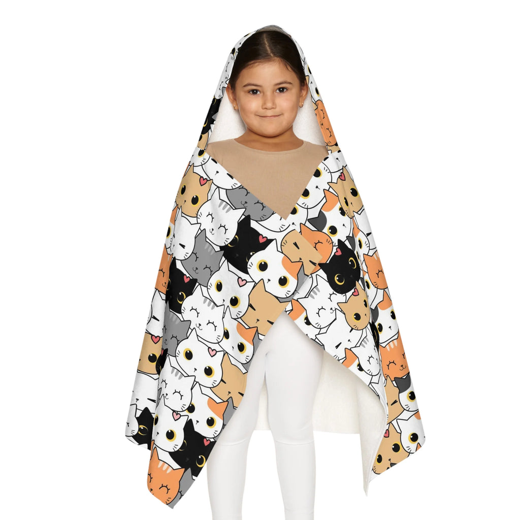 A cozy white hooded towel with colorful cartoon cats in black orange gray and white soft absorbent for kids bath and beach wrap
