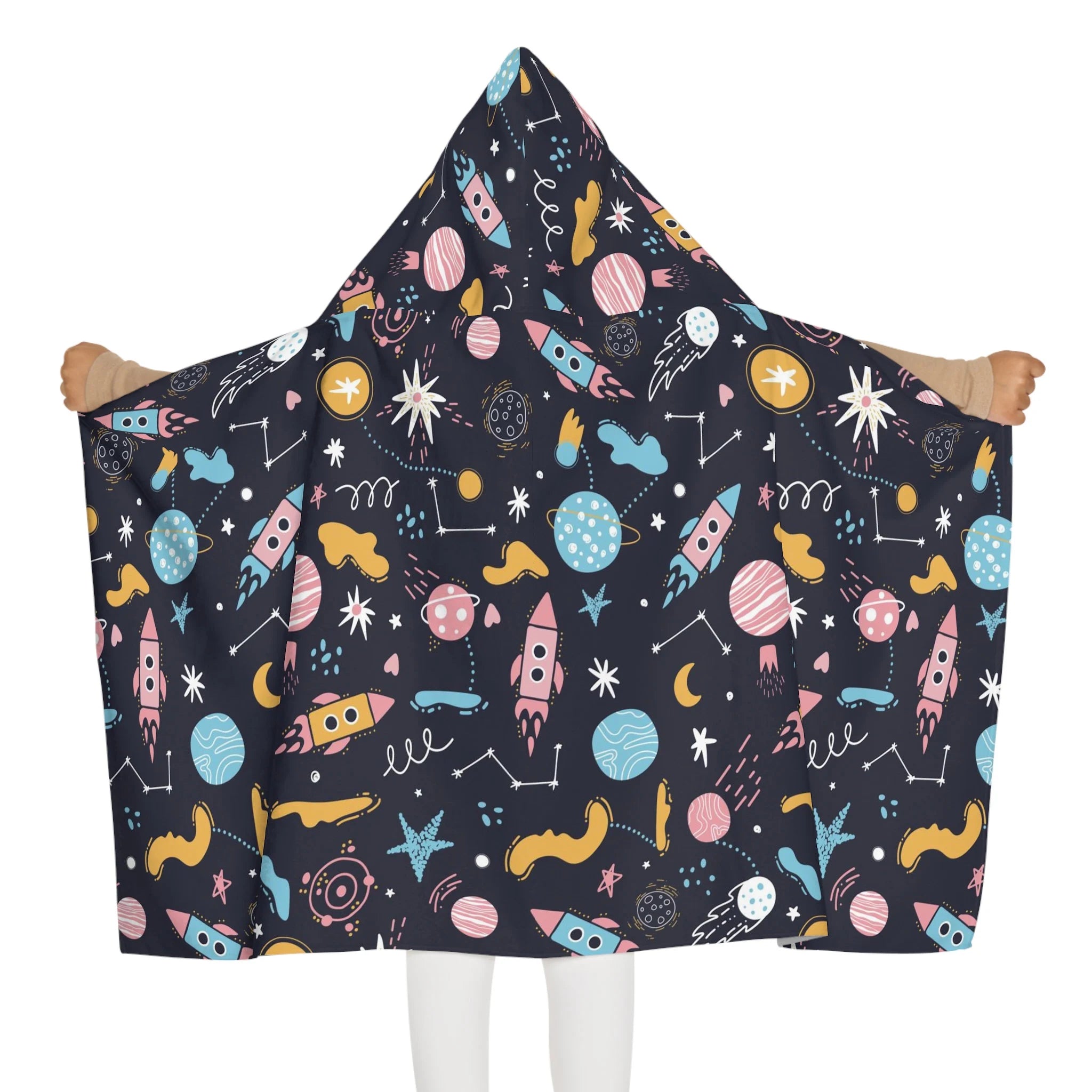 Kids outer space hooded towel in soft absorbent fabric with dark navy and colorful rockets and planets pattern