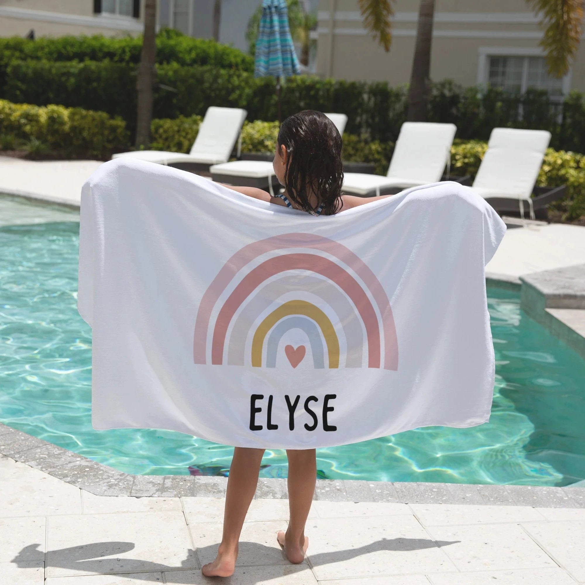 White towel with pastel rainbow heart design personalized with the name Elyse for girls custom name rainbow heart towel