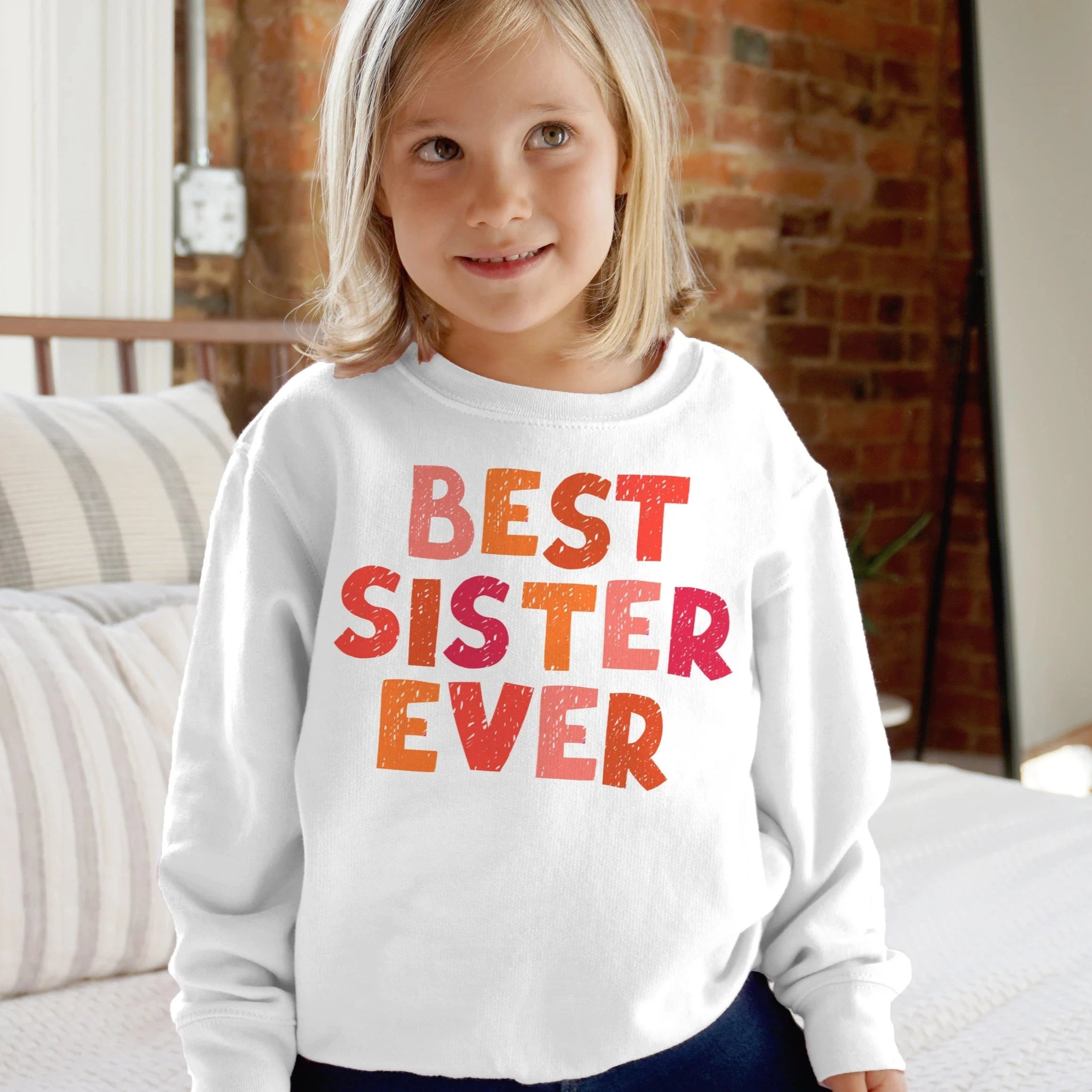 White girls long-sleeved sweatshirt made of soft fabric with best sister ever printed in gradient orange and pink letters
