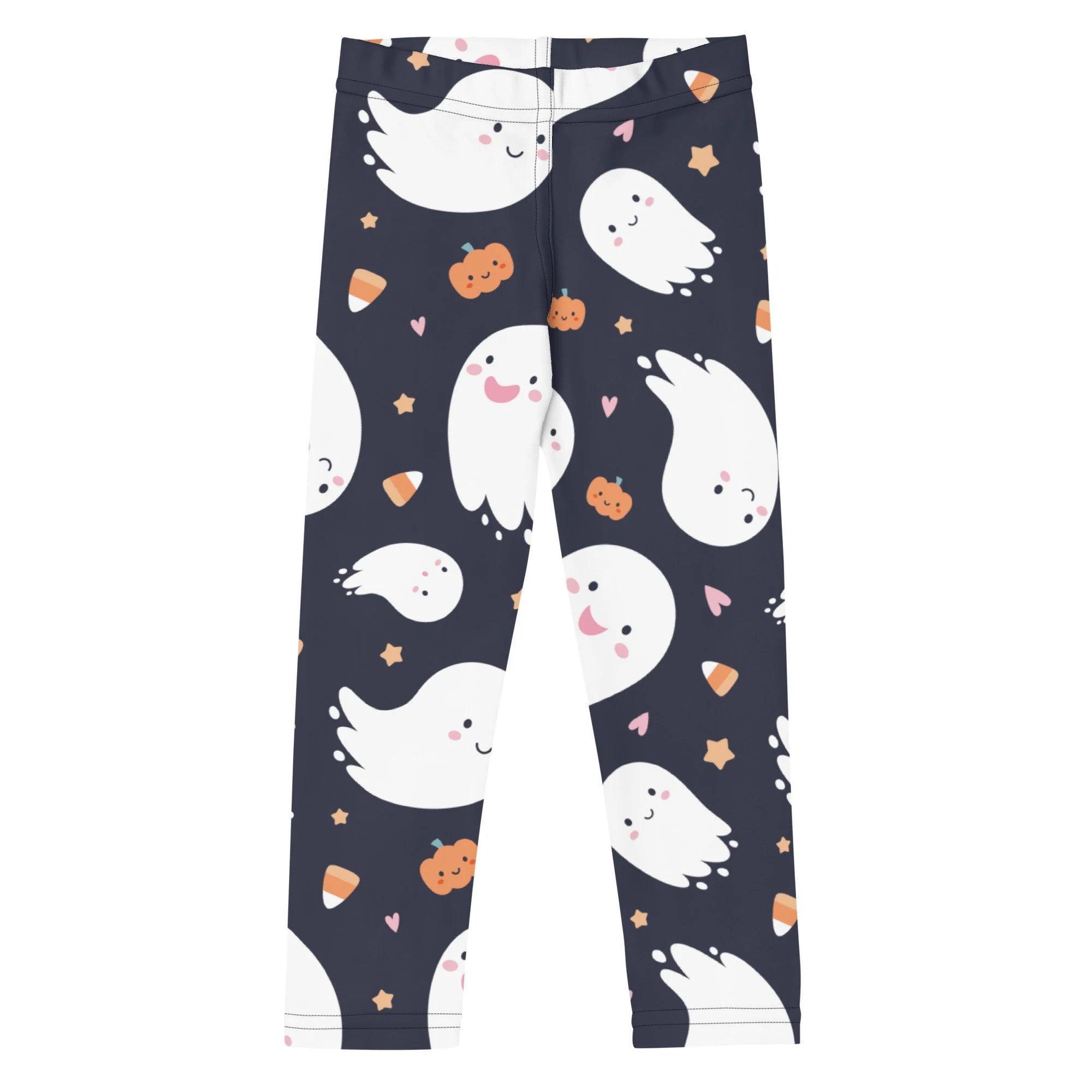 Dark navy buttery soft kids leggings with a playful pattern of white ghosts orange pumpkins and candy corn for halloween