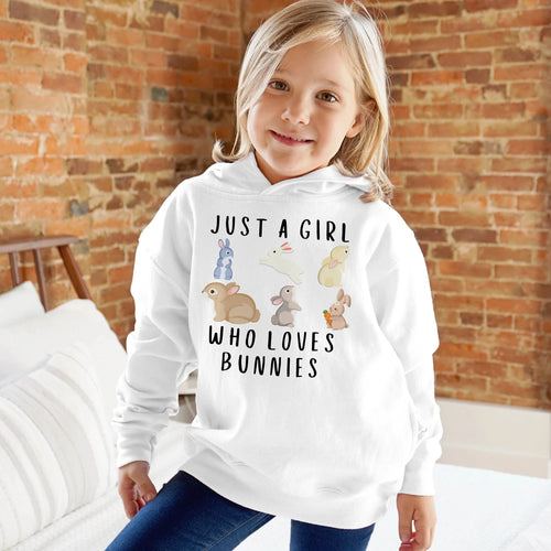 White hooded sweatshirt with playful bunny illustrations and just a girl who loves bunnies text for kids gift