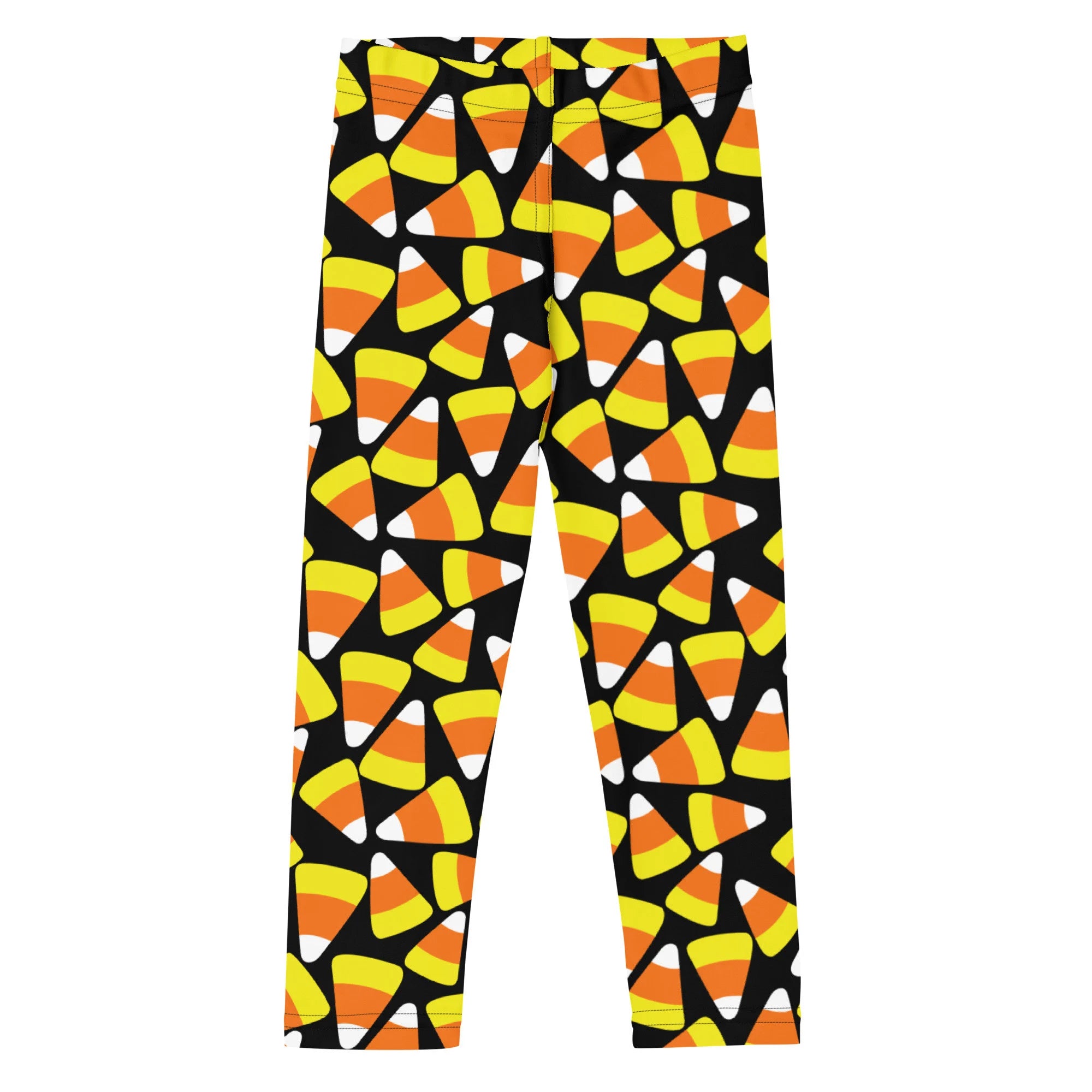 Kids candy corn buttery soft leggings in black featuring a vibrant pattern of orange yellow and white candy corn shapes