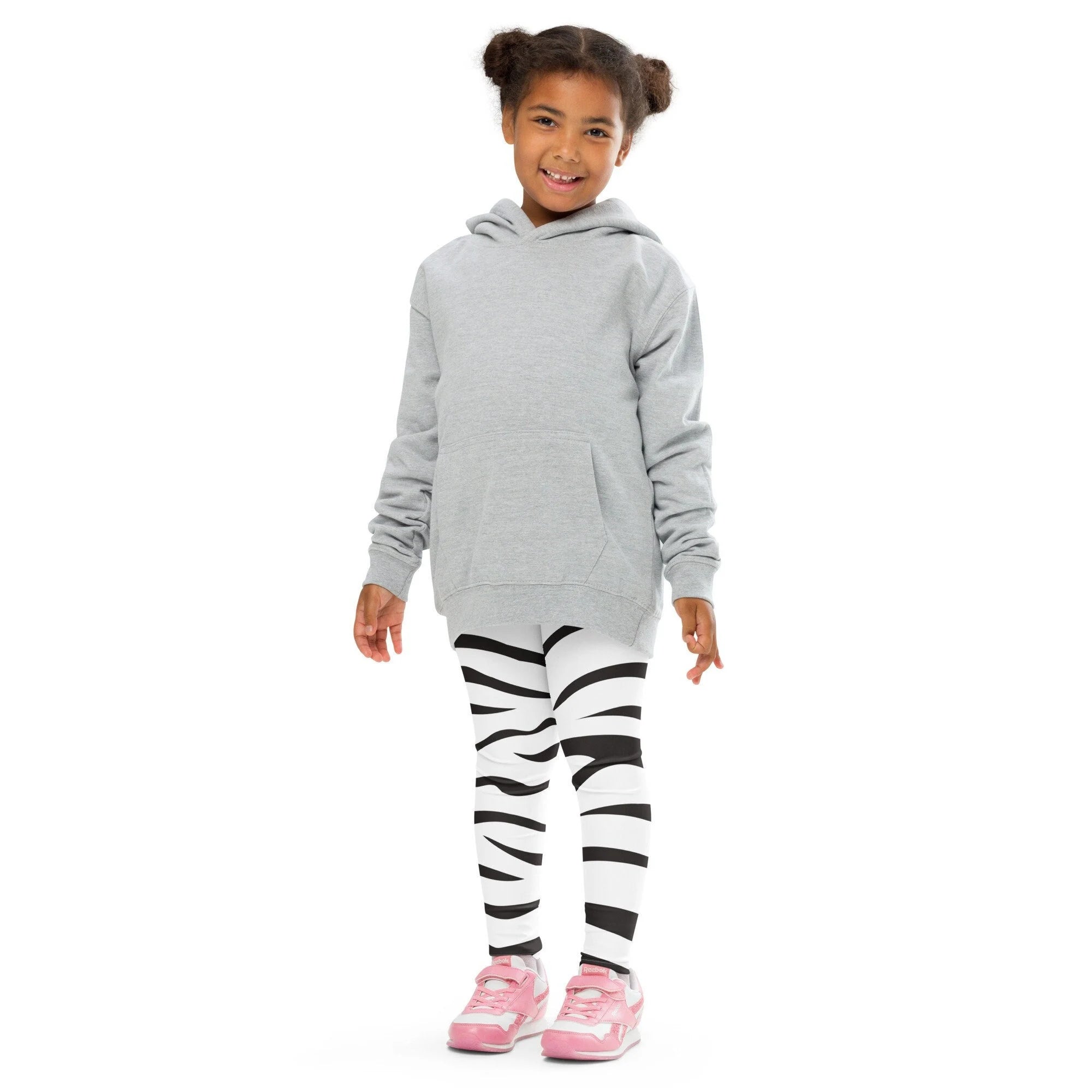 Gray hooded sweatshirt with front pocket and long sleeves paired with kids striped zebra buttery soft leggings