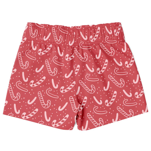 Boys red candy cane Christmas quick drying swim trunks with playful white and light pink candy cane pattern