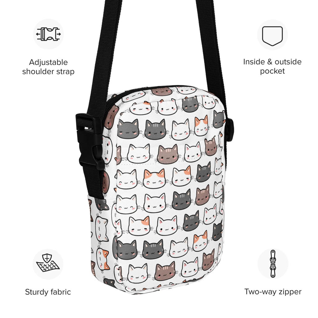 Girls cat crossbody purse with white background featuring multicolored cartoon cats and black adjustable straps