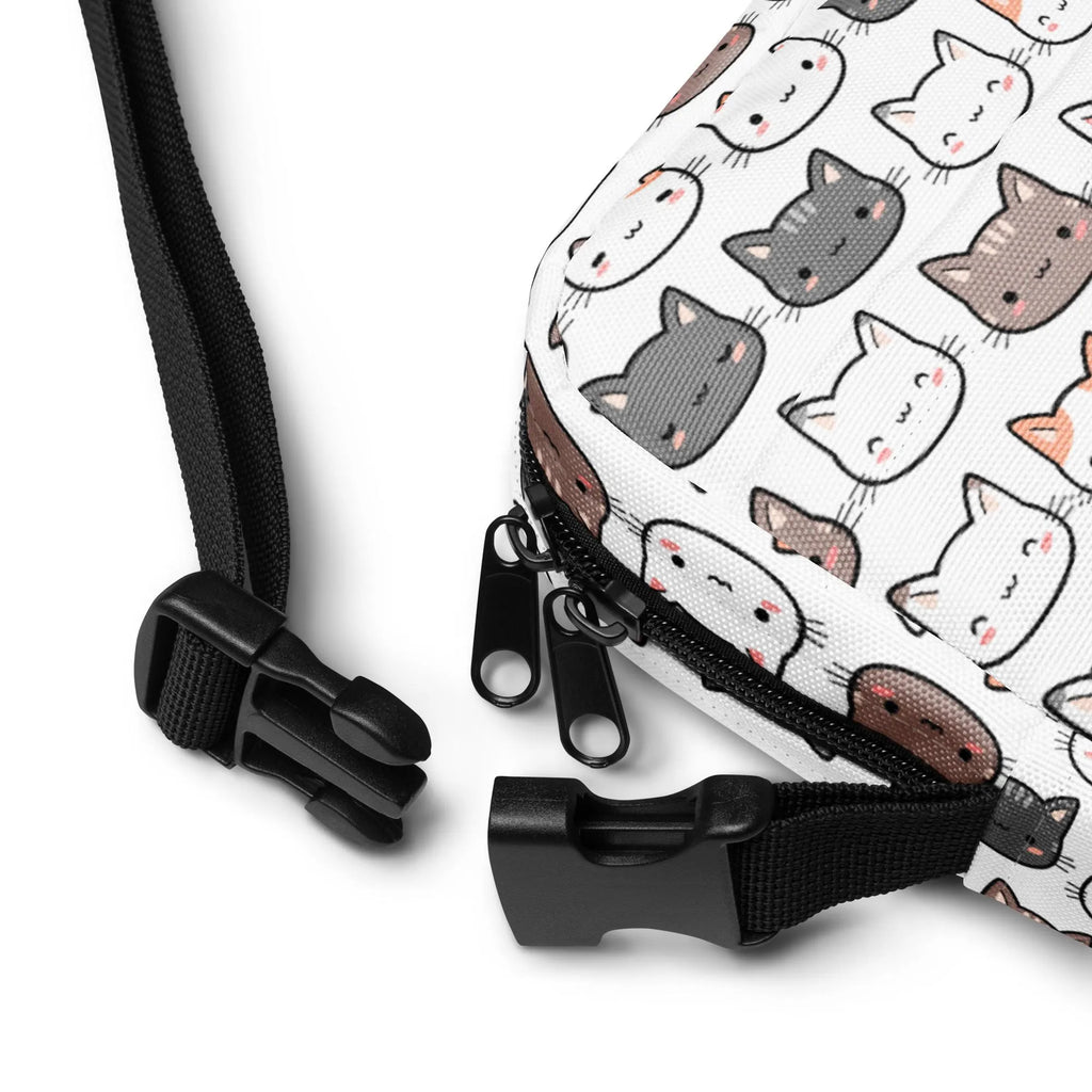 White canvas girls cat crossbody purse with playful cartoon cats pattern in gray brown and white with pink cheeks