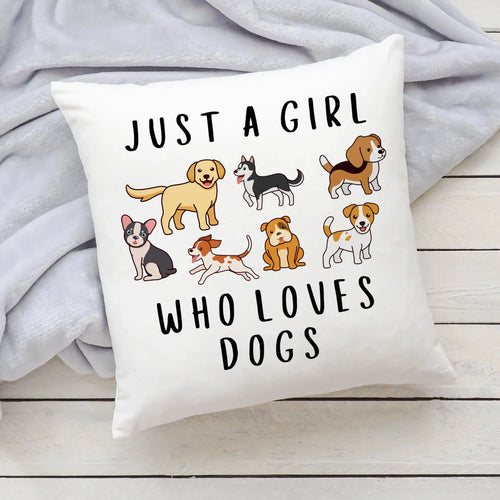White throw pillow with playful cartoon dog breeds and black text just a girl who loves dogs for girls bedroom decor