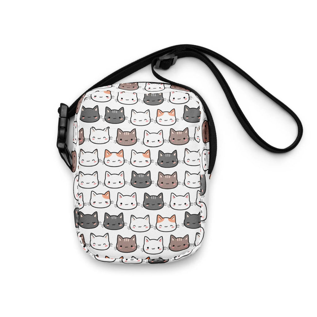 White crossbody bag for girls featuring a playful pattern of colorful cartoon cats for casual use