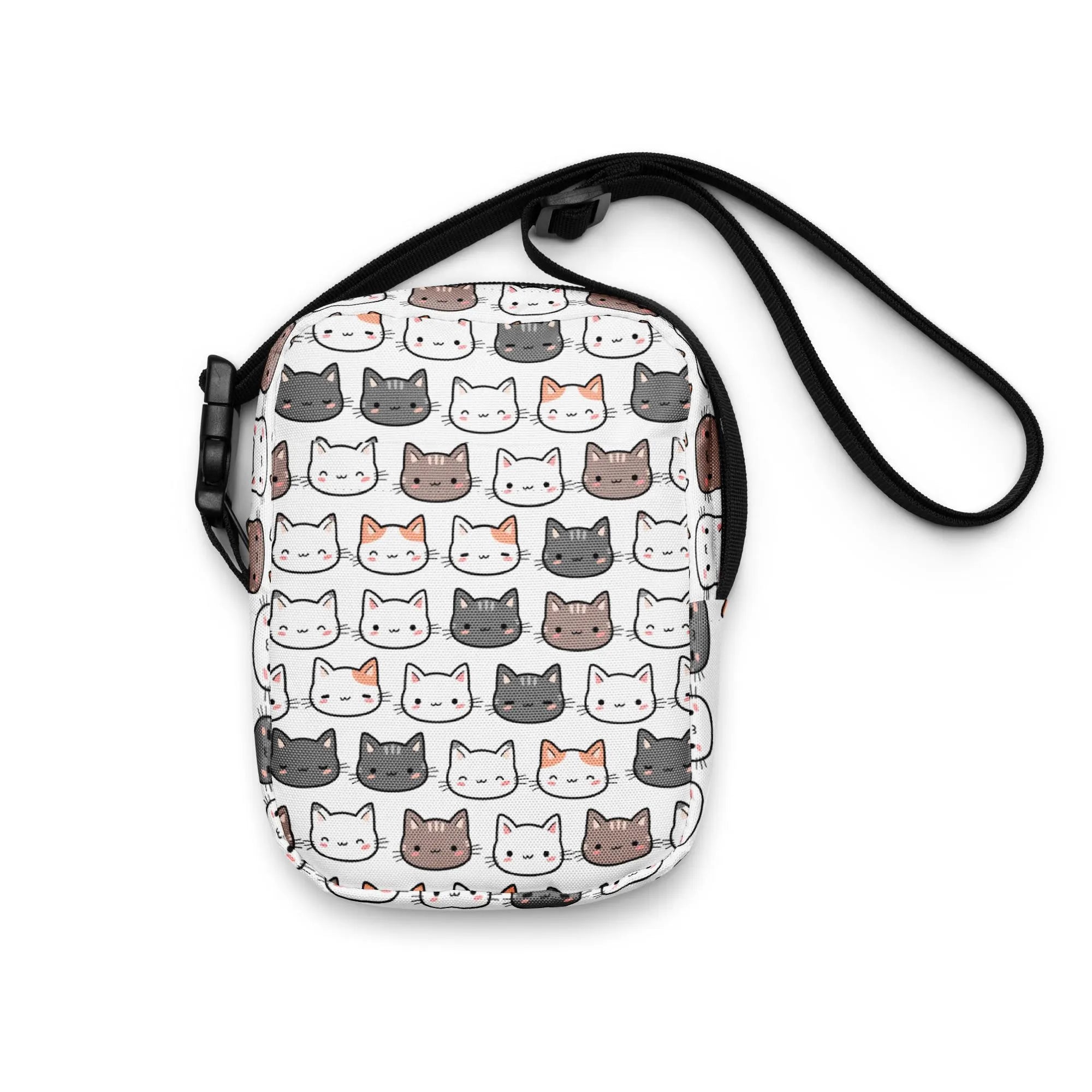 White crossbody bag for girls featuring a playful pattern of colorful cartoon cats for casual use