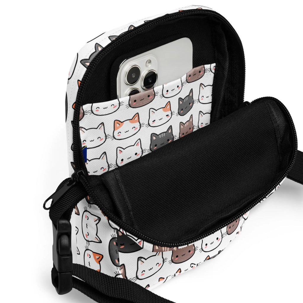 White girls cat crossbody purse with playful cartoon cat pattern black zippers and adjustable strap for phone and essentials
