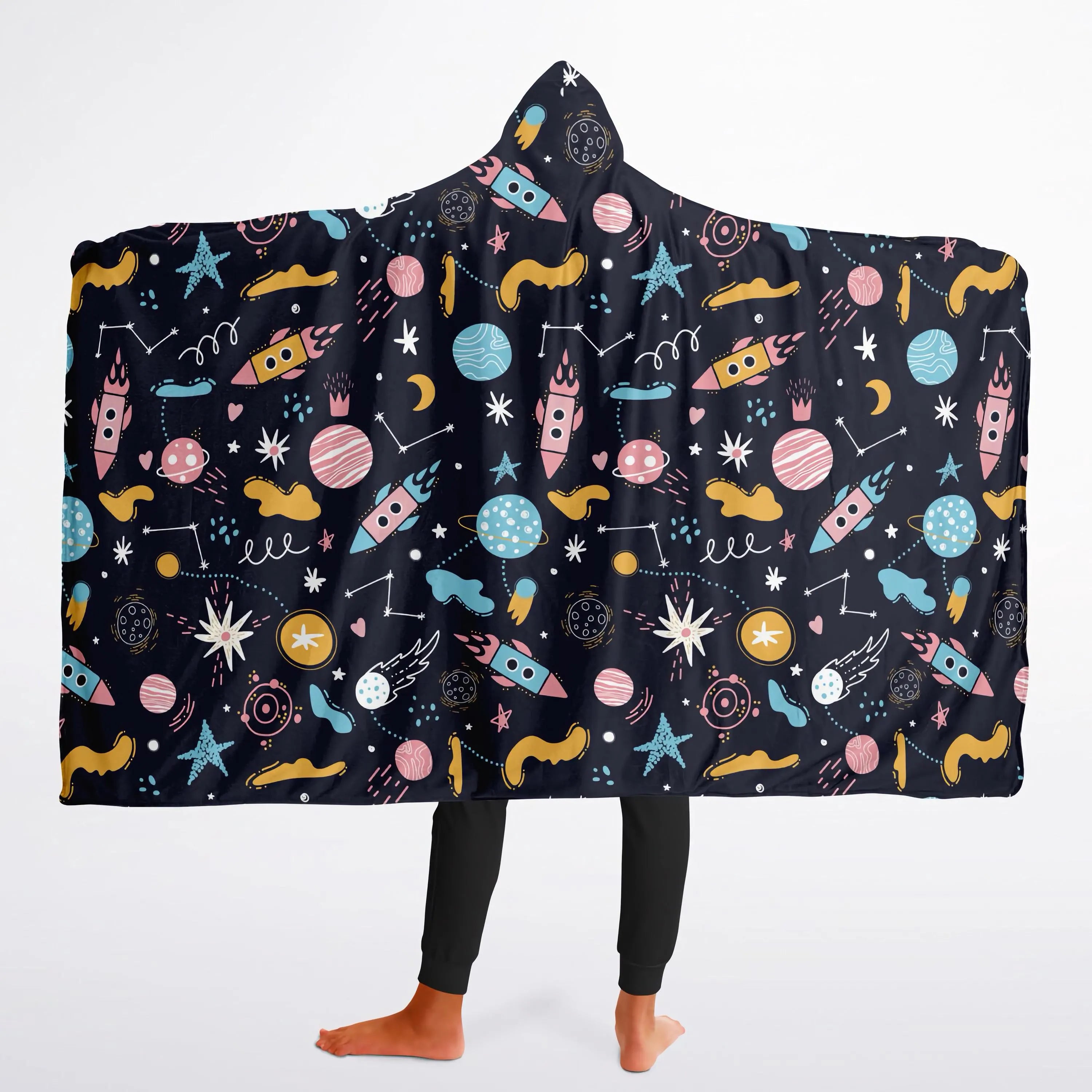 A cozy black hooded kids wearable blanket with colorful space-themed rockets, planets, stars, and constellations pattern