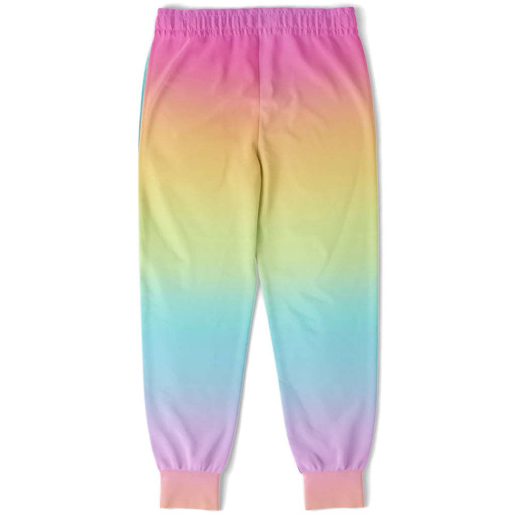 Girls bright rainbow jogger pants featuring rainbow gradient soft stretchy fabric and pink elastic waistband