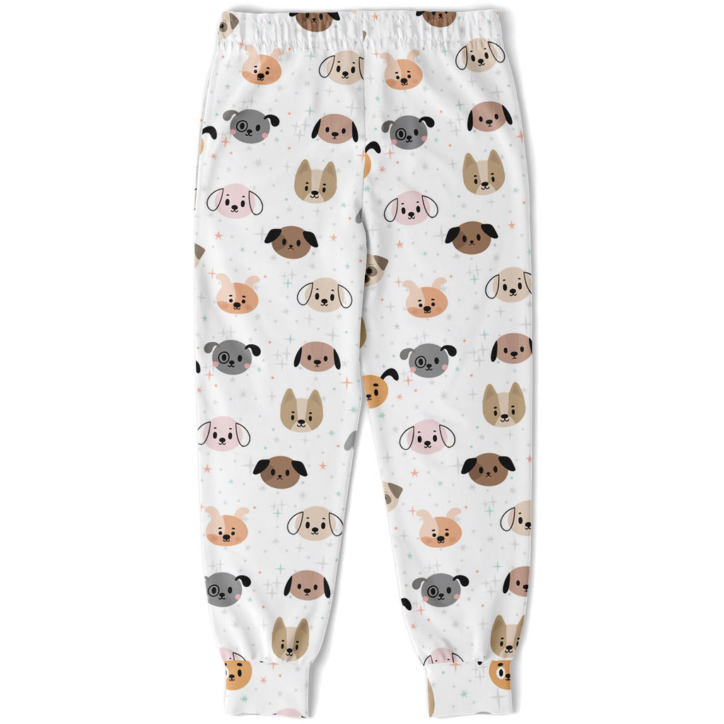 Kids dog face jogger pants in white featuring a playful cartoon dog pattern in beige brown and gray tones