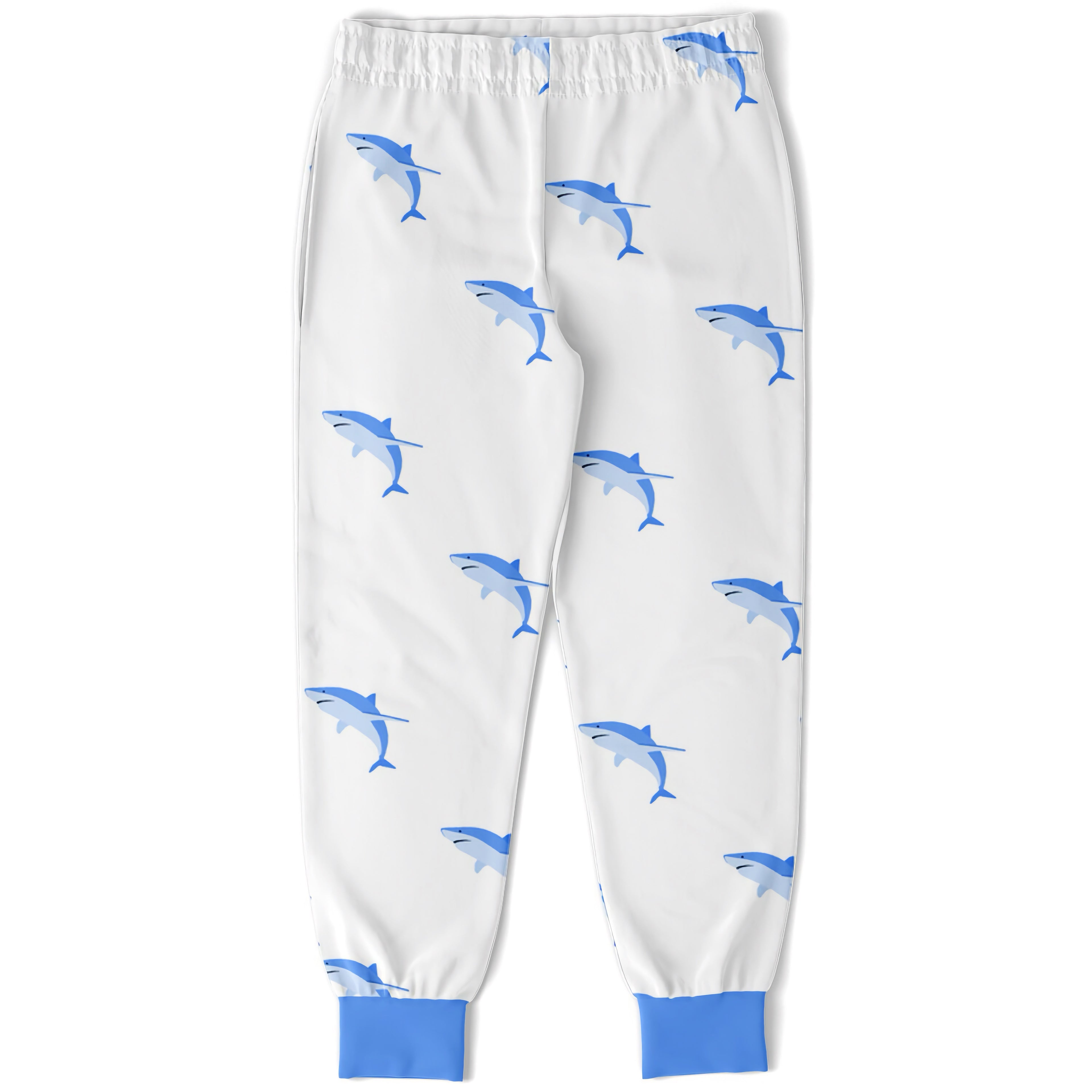 Kids shark jogger pants in white cotton with blue shark pattern and solid blue cuffs for comfortable play