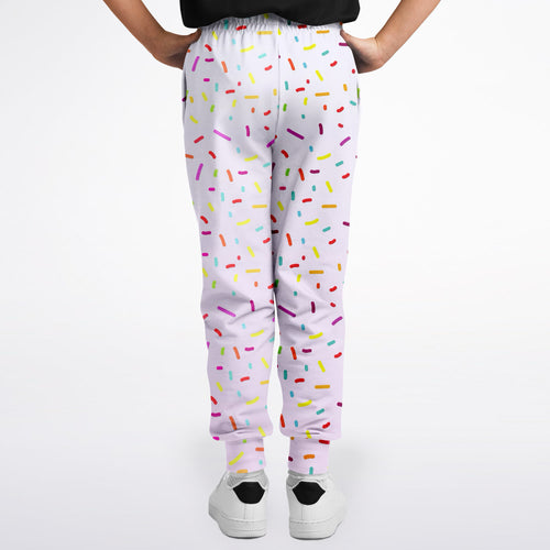 White girls jogger pants with colorful sprinkle pattern perfect for casual and playful wear