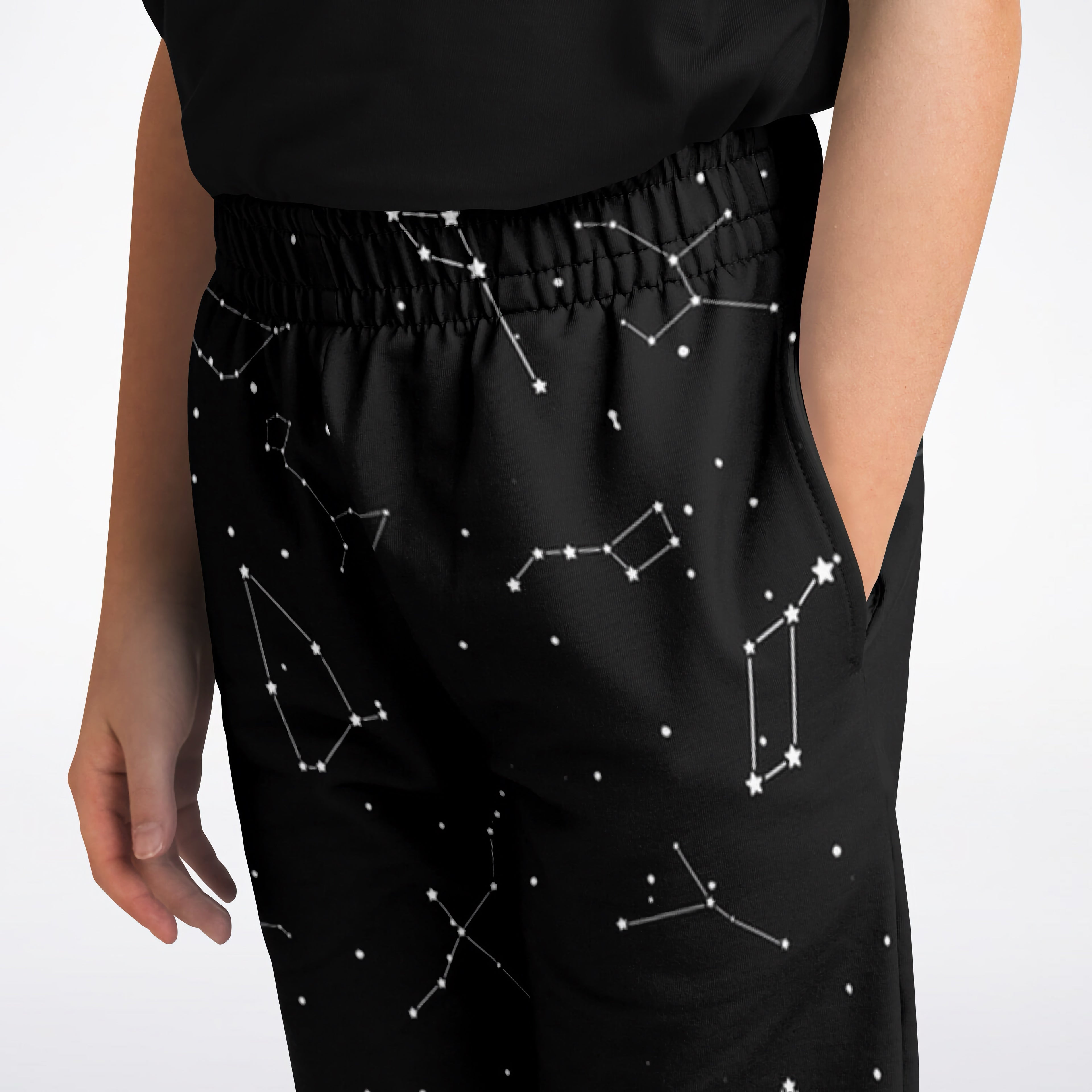 Kids realistic constellations jogger pants in black satin featuring a white connected star print and scattered dots