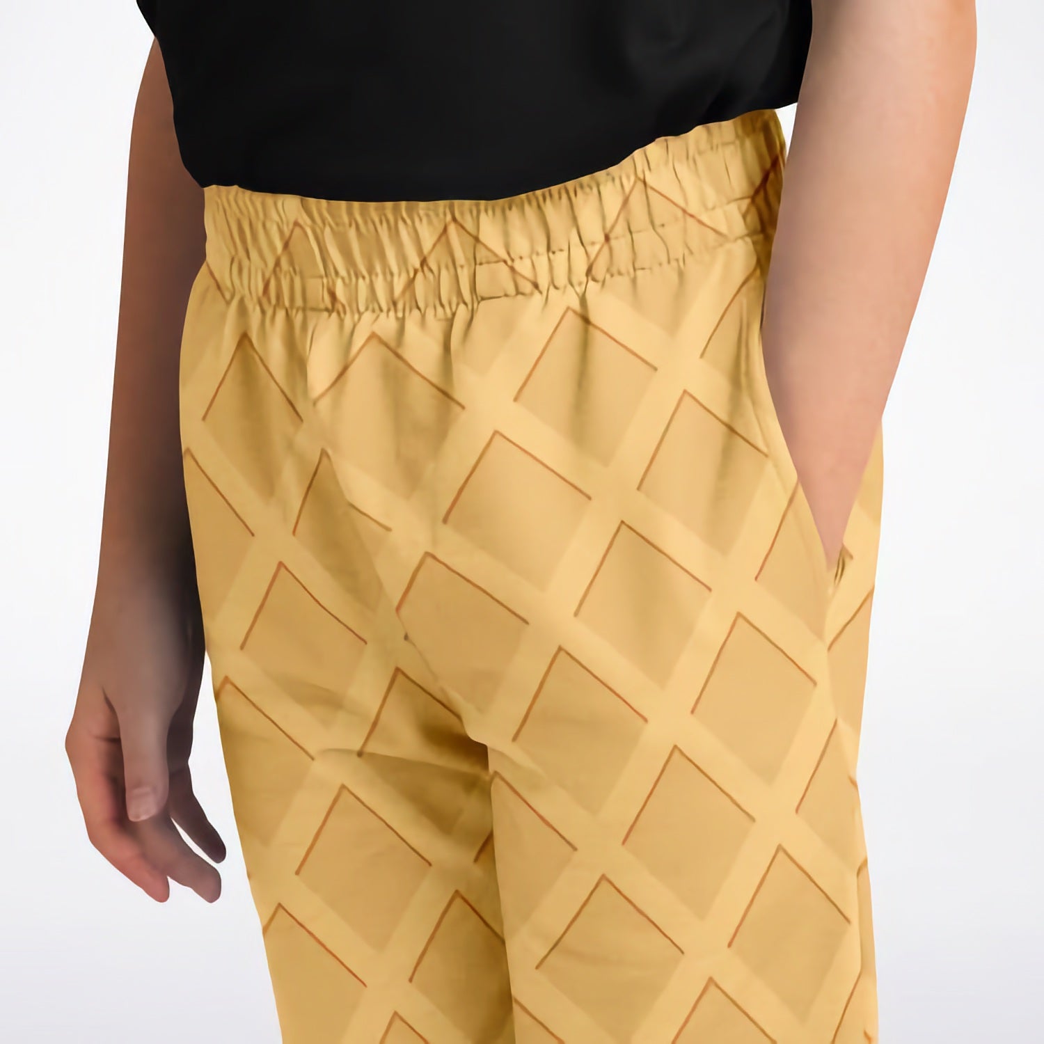 Kids waffle cone jogger pants in yellow waffle cone pattern with stretchy elastic waistband for comfortable wear