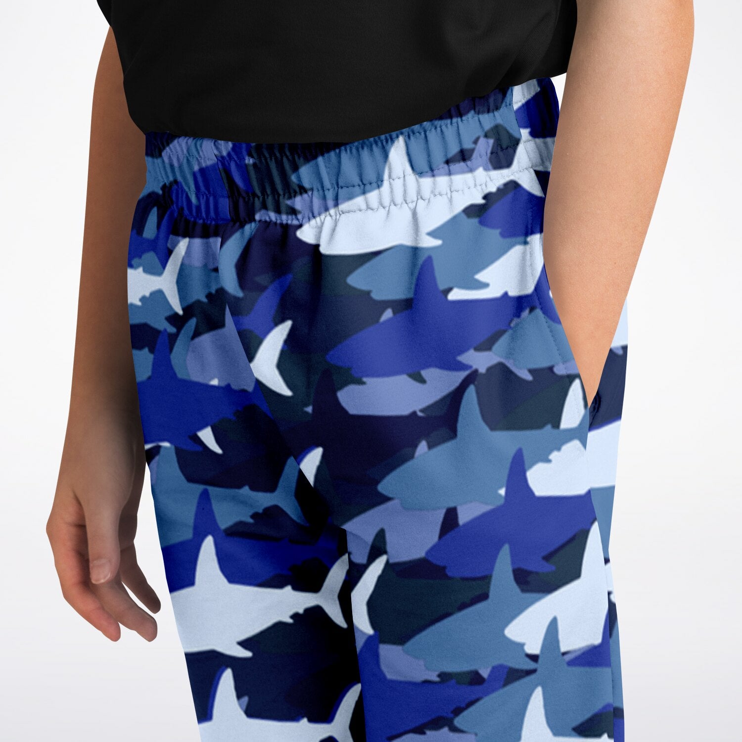 Kids blue shark jogger pants with blue and white shark camouflage pattern designed for comfortable playwear