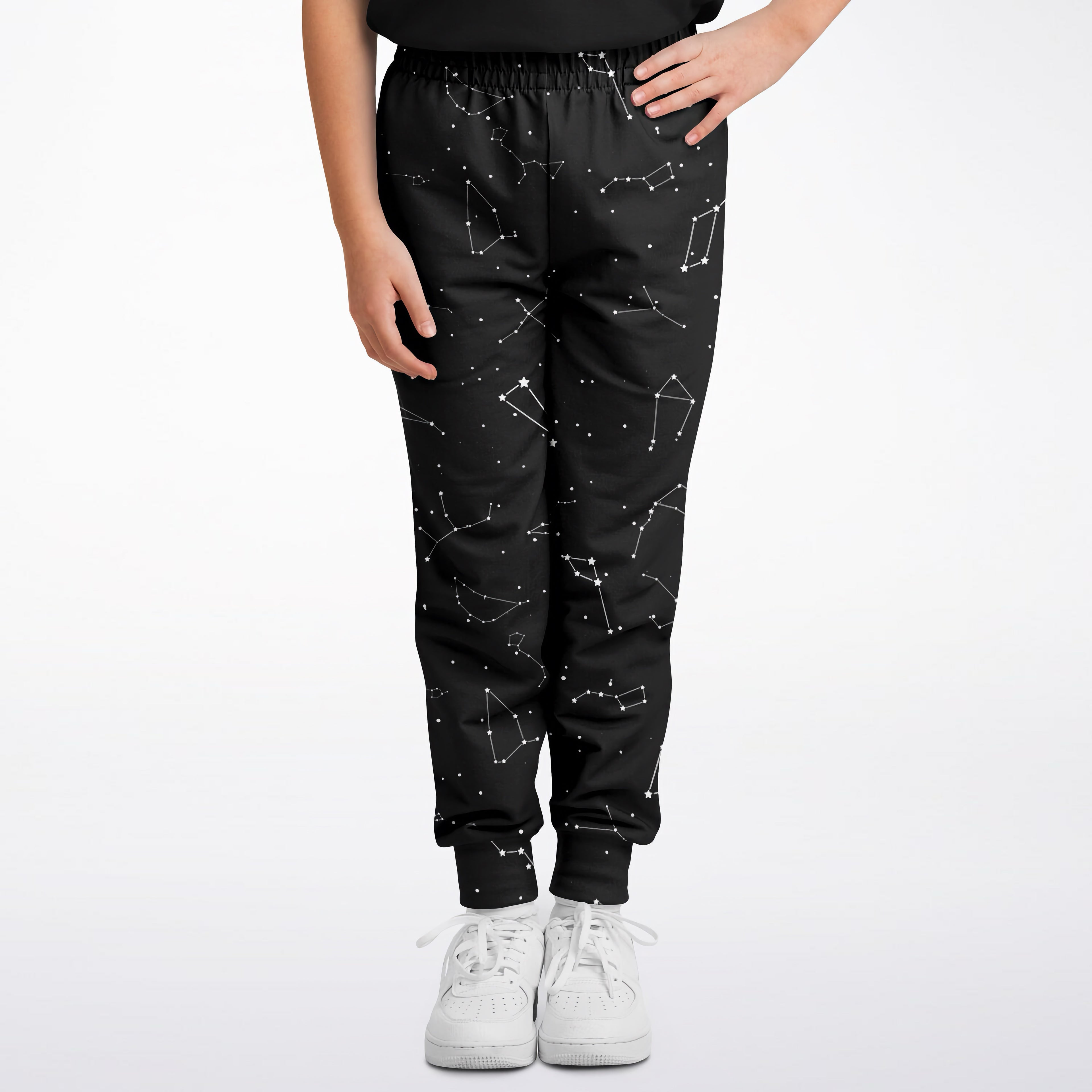 Kids realistic constellations jogger pants in black featuring a white constellation pattern across the fabric