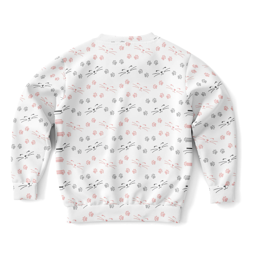 White girls sweatshirt with pink and gray cat faces and paw prints made of cozy cotton fleece or lightweight fabric
