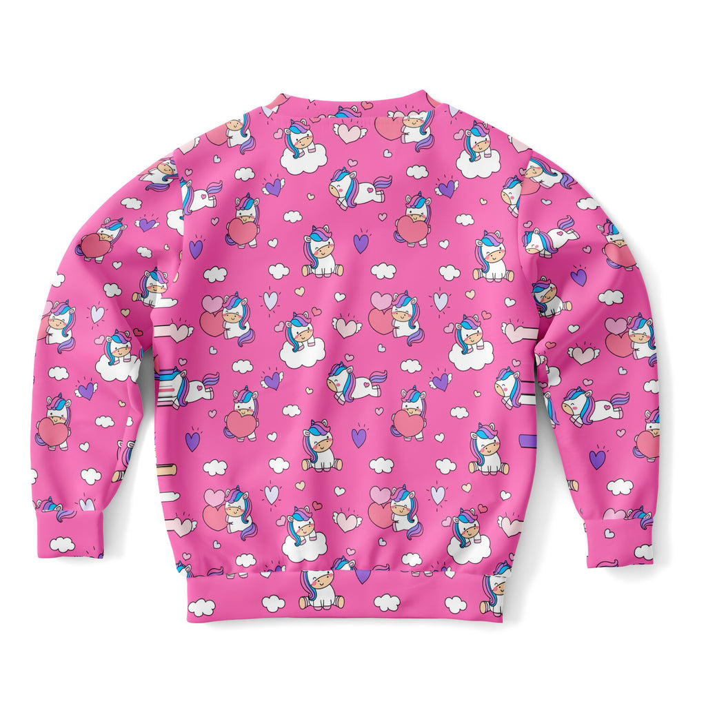 Girls unicorn hearts sweatshirt in pink with playful unicorn print made from cozy cotton fleece or lightweight sports fabric