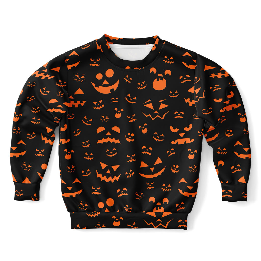 Kids jack-o-lantern halloween sweatshirt in black cotton fleece with orange pumpkin face pattern all over