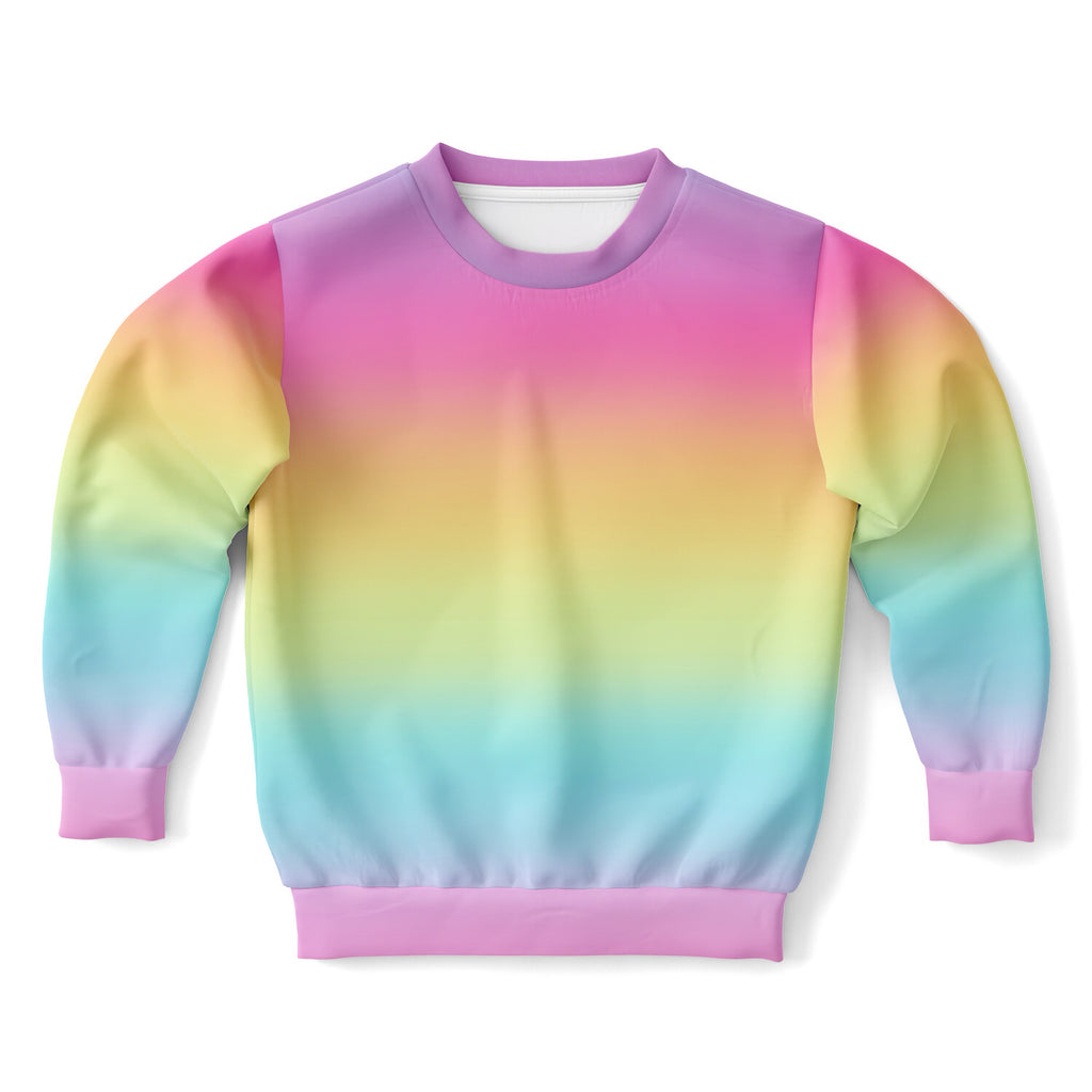 Girls bright rainbow sweatshirt with vibrant gradient, soft smooth fabric, ribbed pink cuffs, cozy cotton fleece material