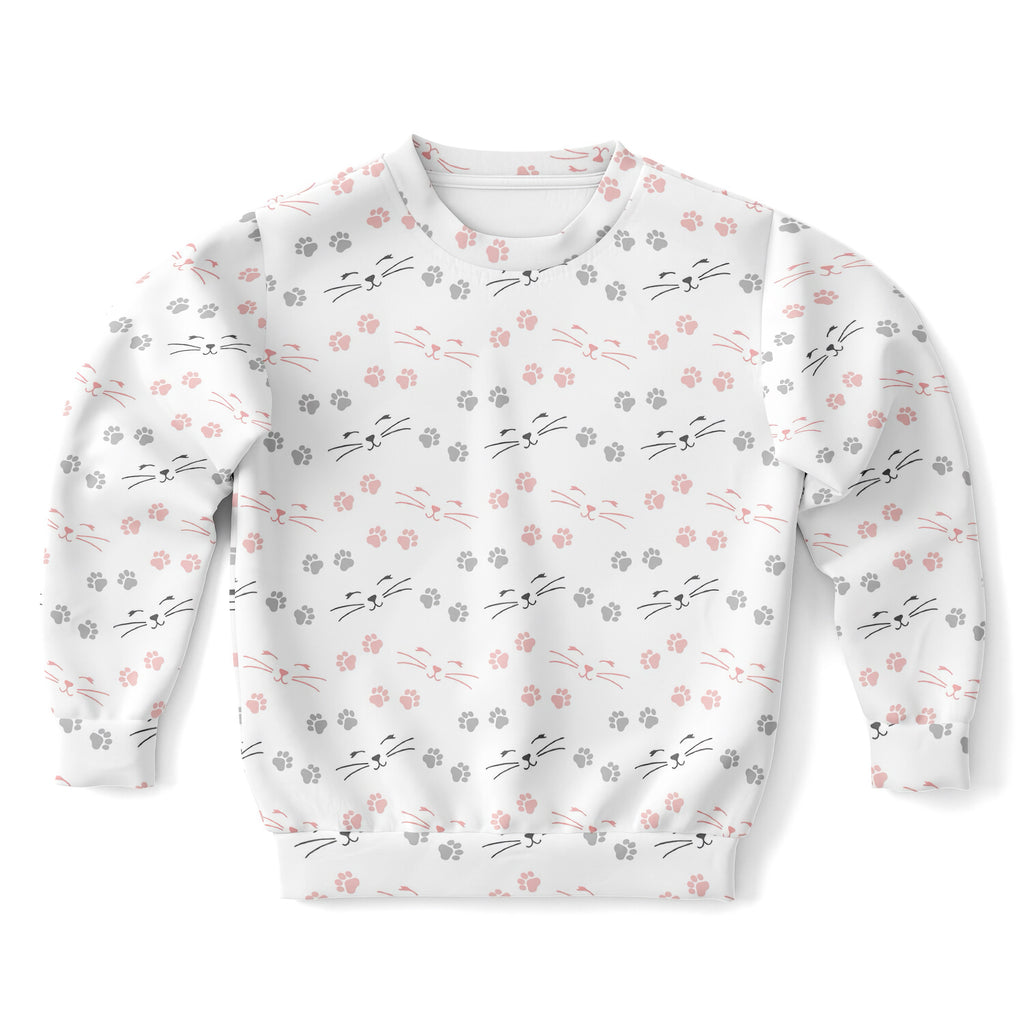 White girls sweatshirt with pink and gray cat face pattern and paw prints made of cozy cotton fleece or lightweight fabric