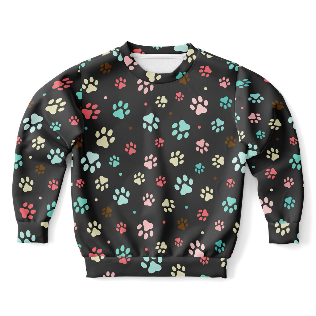 Black kids sweatshirt with colorful pink teal cream and brown paw prints made of cozy cotton fleece or lightweight fabric