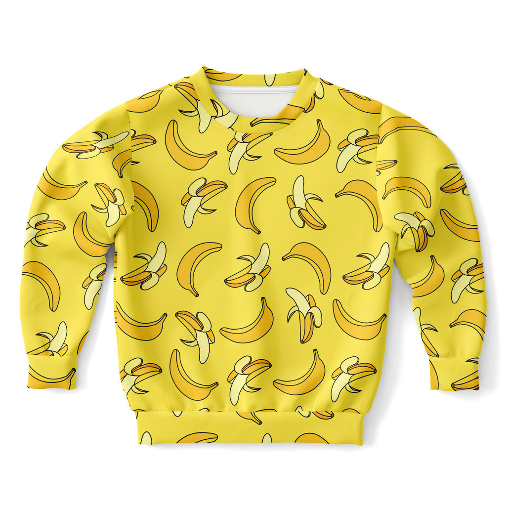 Kids yellow banana sweatshirt with playful all-over cartoon print made from cozy cotton fleece or lightweight sports fabric