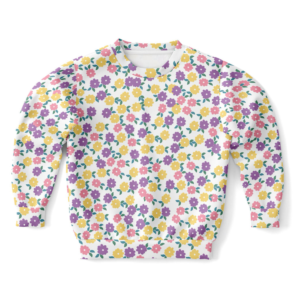 White long-sleeved girls floral sweatshirt with pastel pink yellow and purple flowers in cozy cotton fleece fabric
