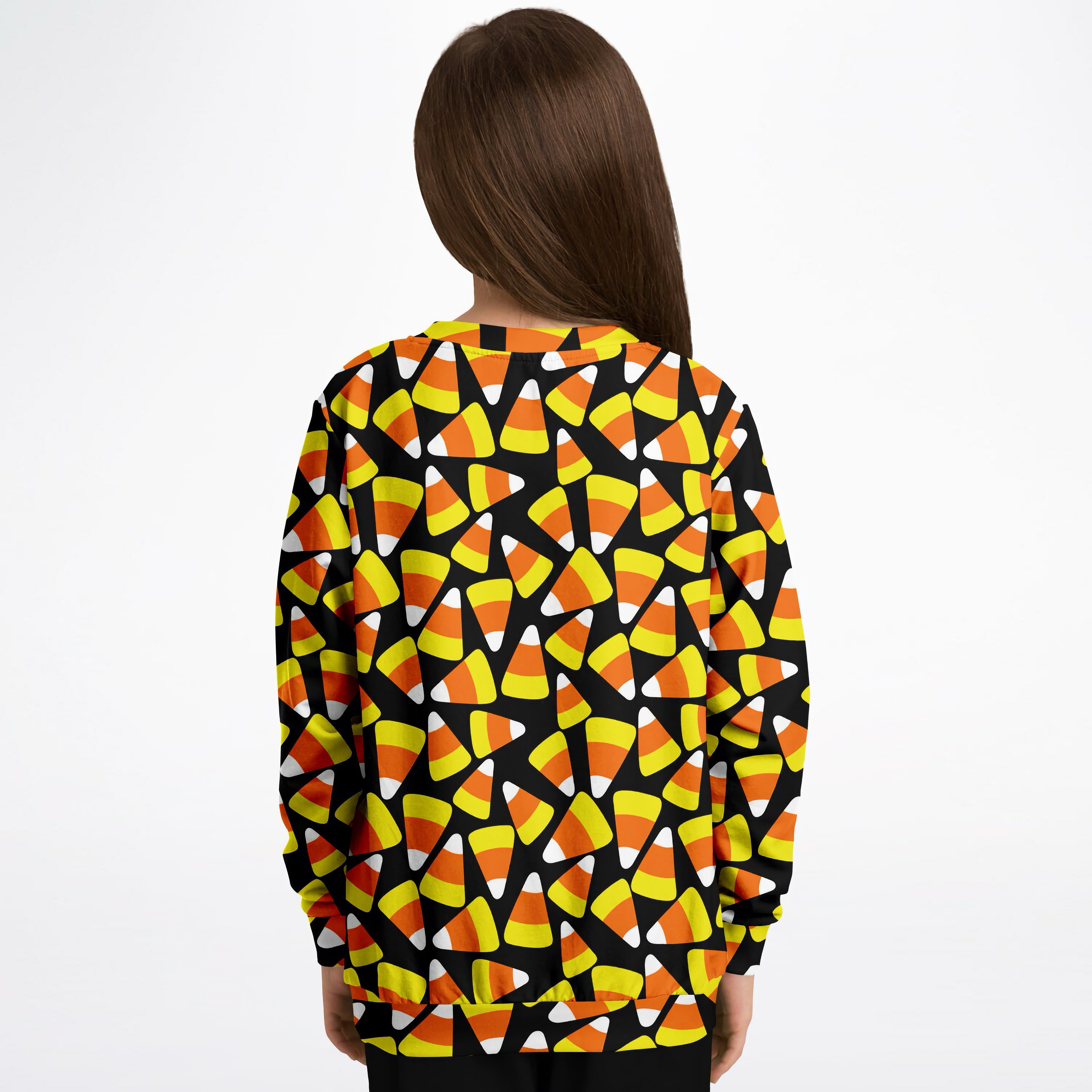 Kids candy corn halloween sweatshirt in black with vibrant orange yellow and white candy corn pattern in cozy cotton fleece