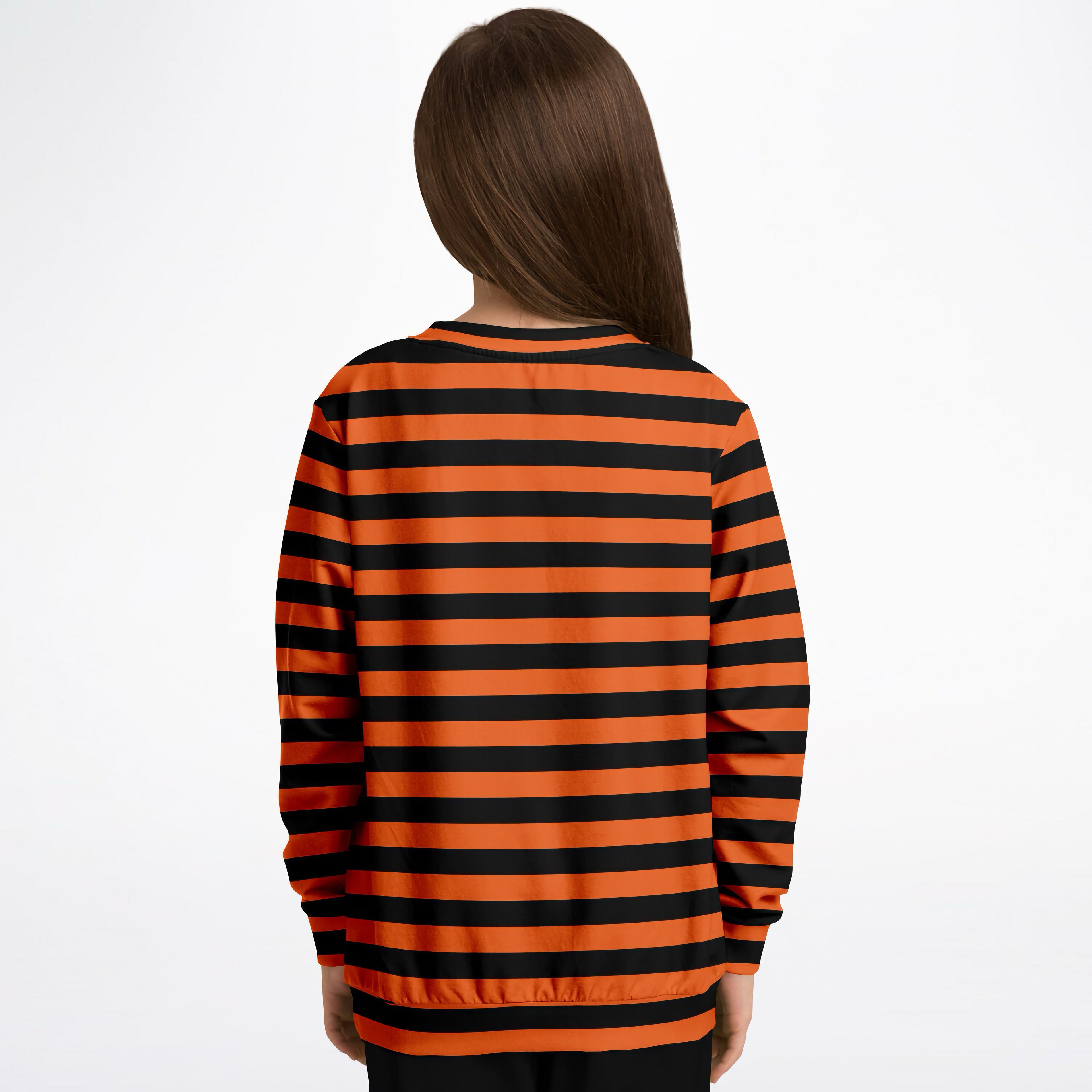 A child wearing a kids orange and black striped Halloween sweatshirt in cozy cotton fleece fabric