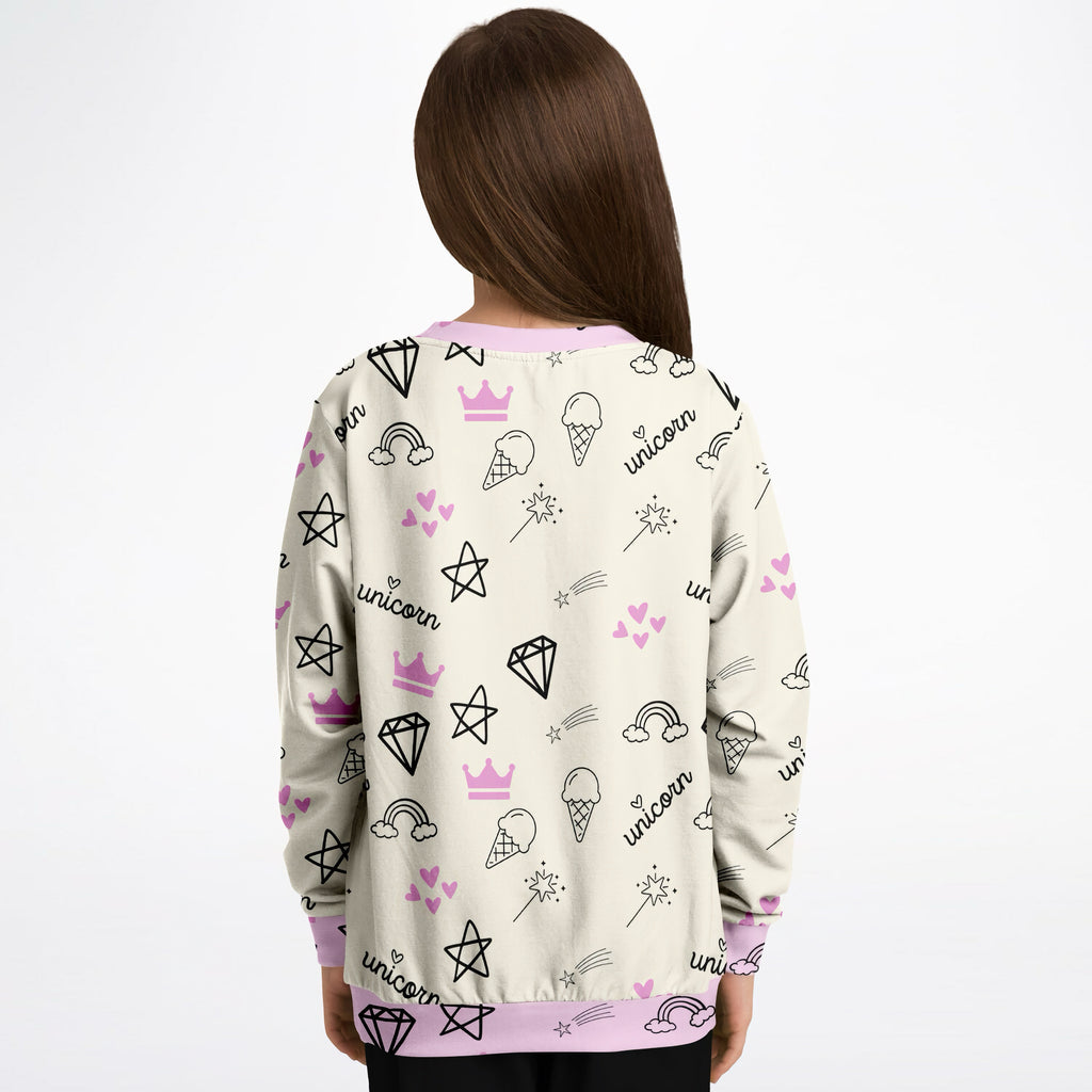 Cream-colored girls magical unicorn sweatshirt with playful black outlined unicorns and pink accents in cozy cotton fleece