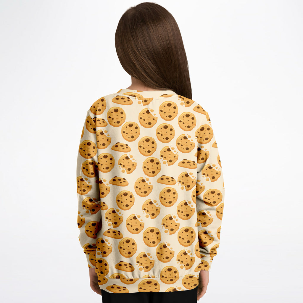Cream-colored kids sweatshirt with playful chocolate chip cookie print in cozy cotton fleece or lightweight sports fabric