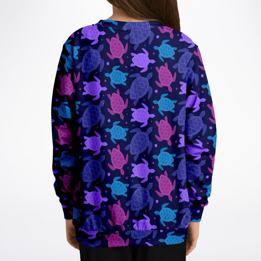 Girls purple sea turtle sweatshirt in navy blue with vibrant sea turtle pattern made of cozy cotton fleece or lightweight fabric